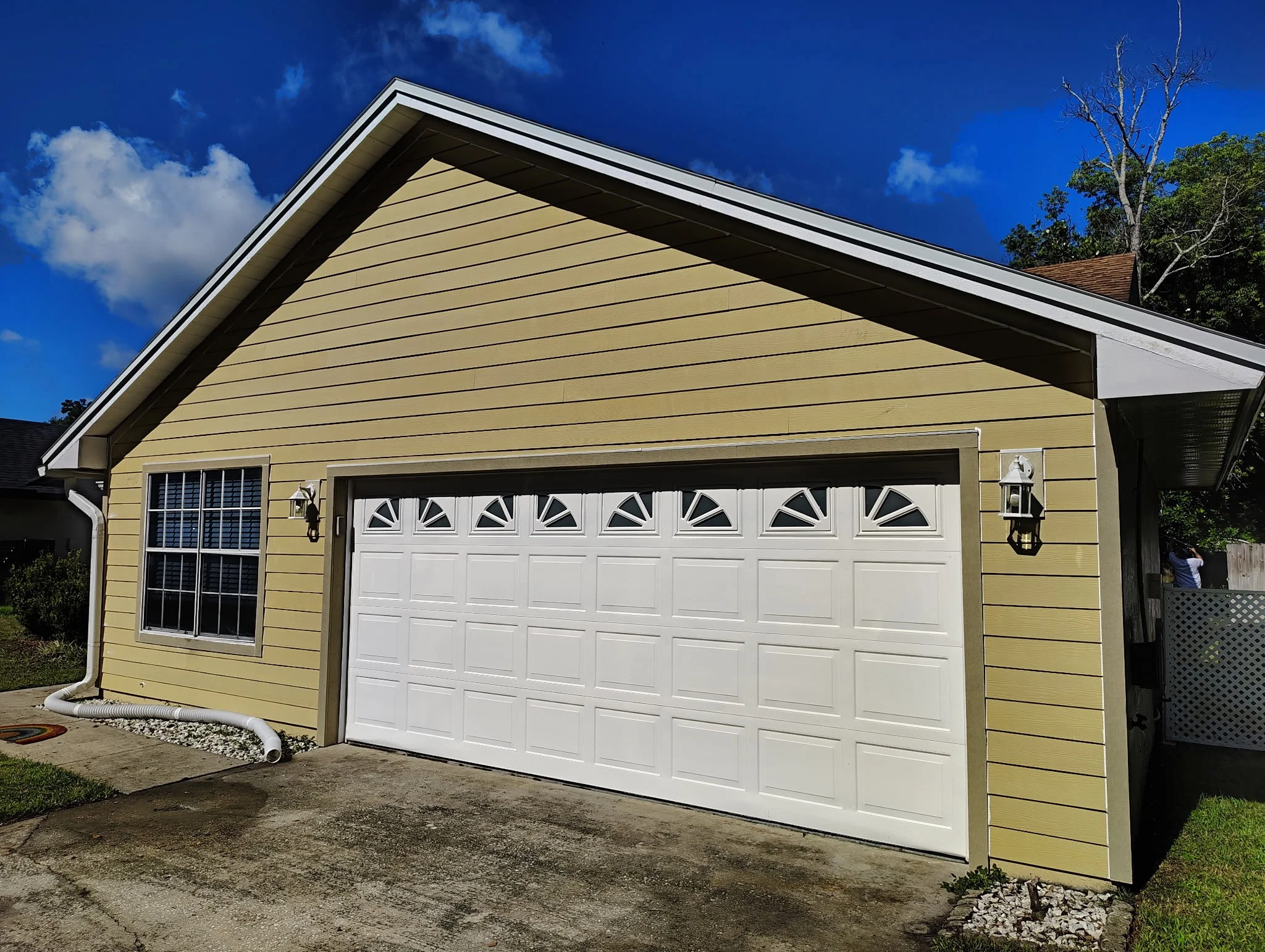BEFORE — GARAGE AND SIDING