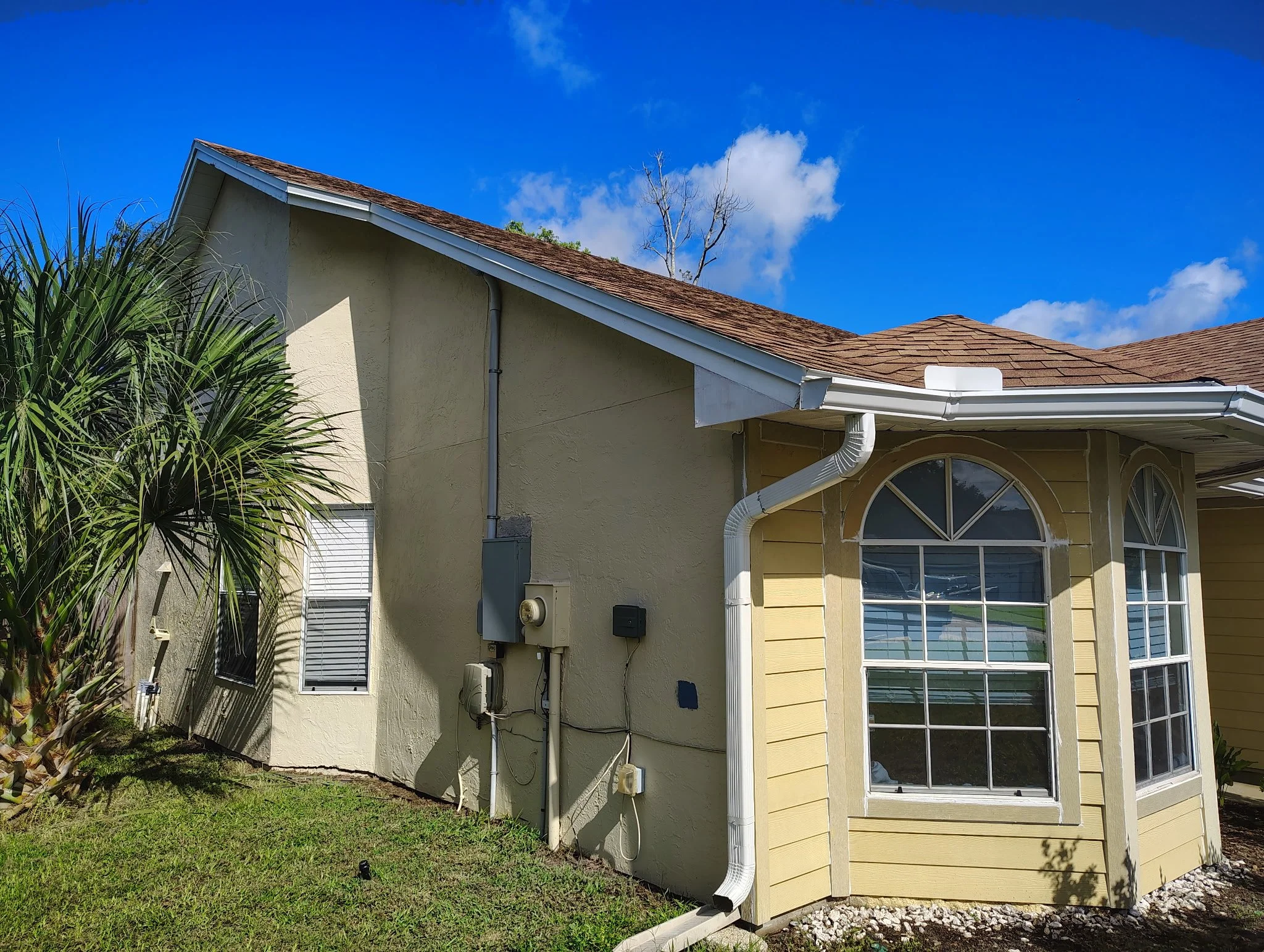 BEFORE — FRONT AND SIDE EXTERIOR