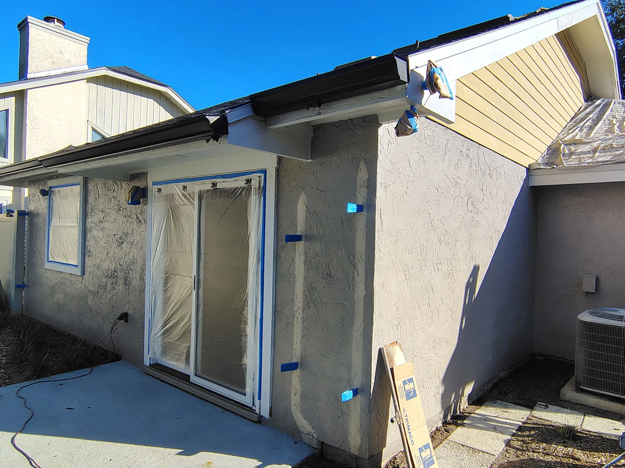 Rear patio and sliding glass doors