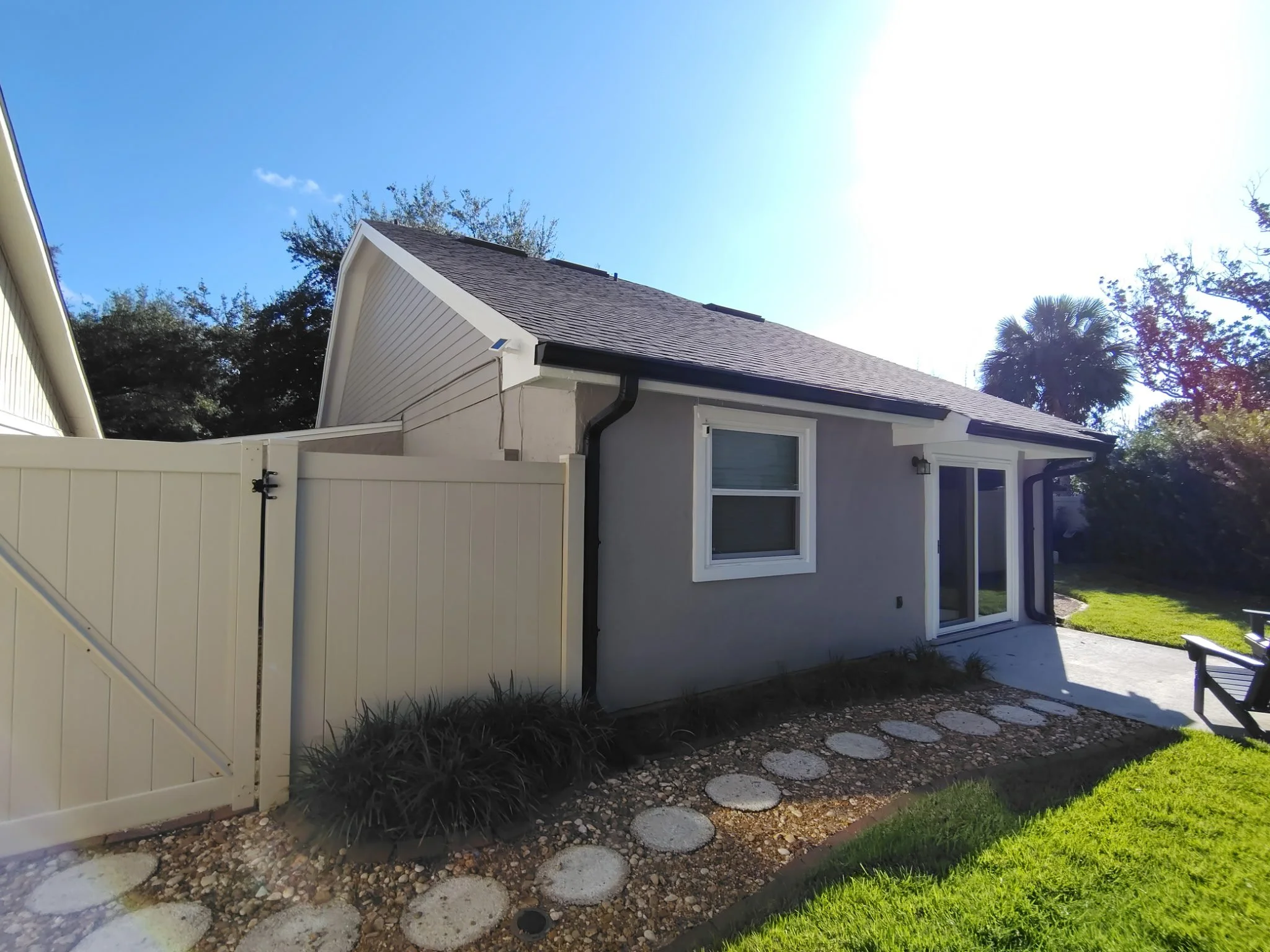 Rear side entrance and landscaped yard