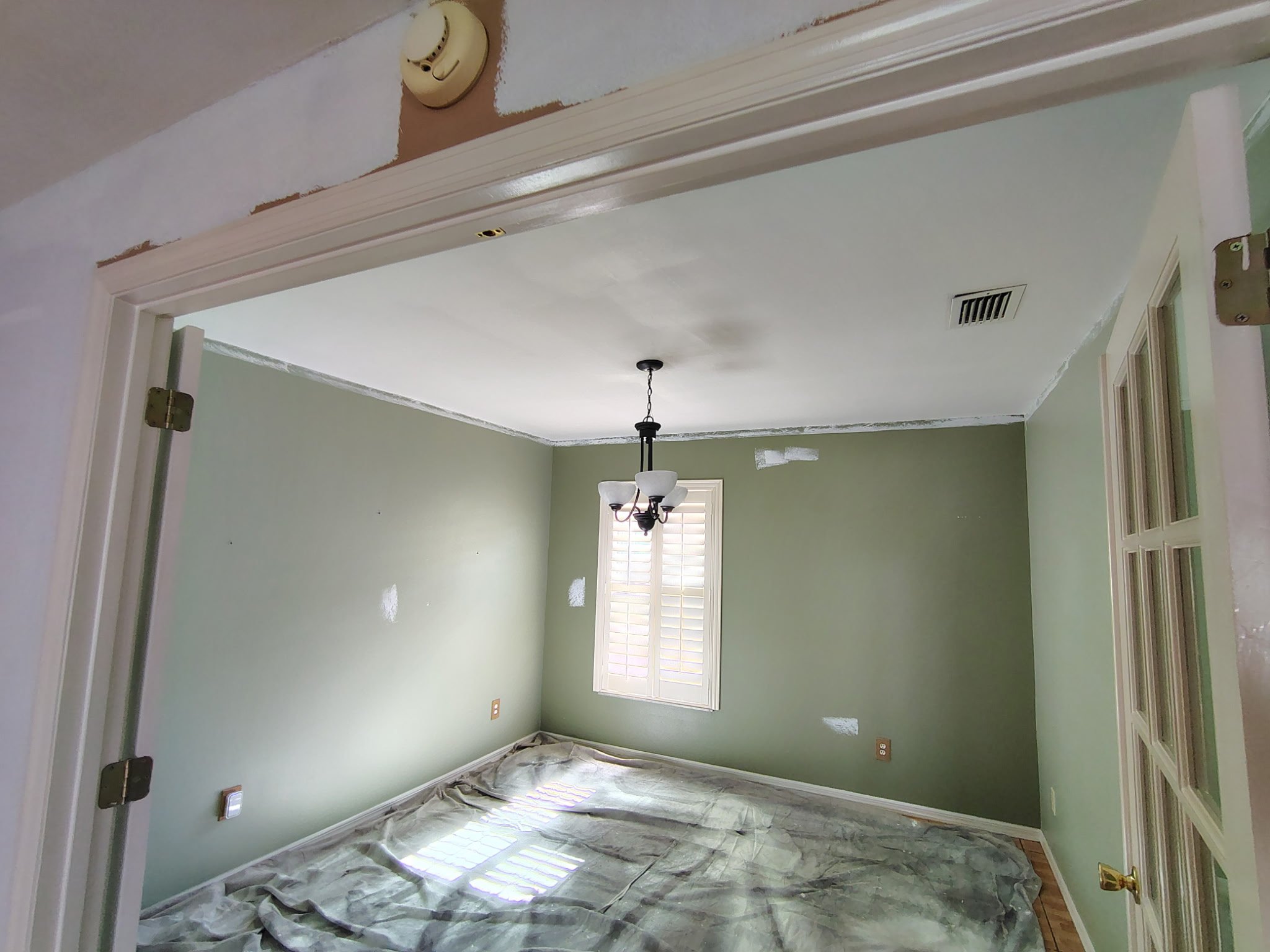Interior room preparation before repainting in Winter Garden Florida