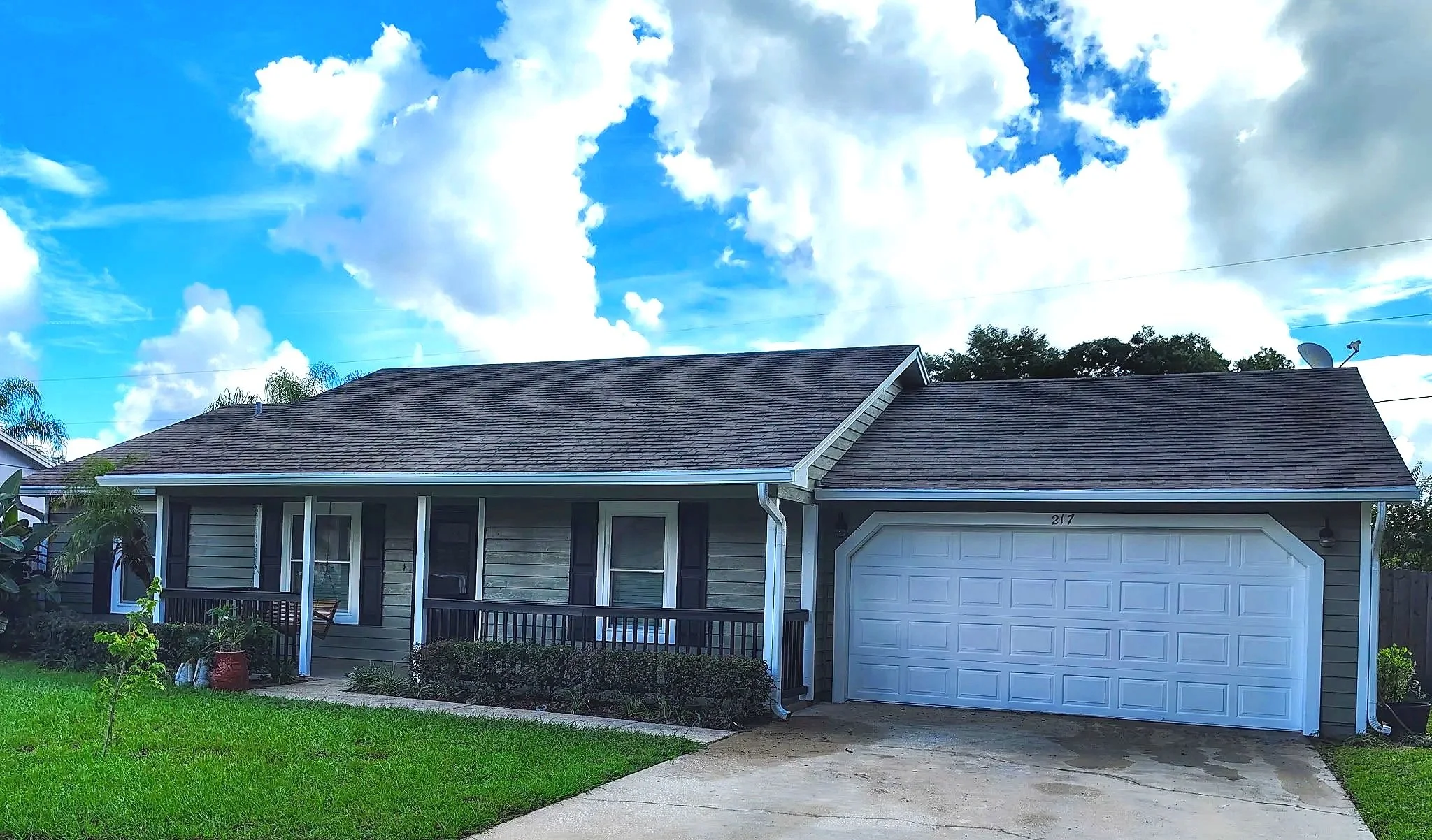 Completed exterior house painting transformation in Apopka FL by Coats of Quality Painting.