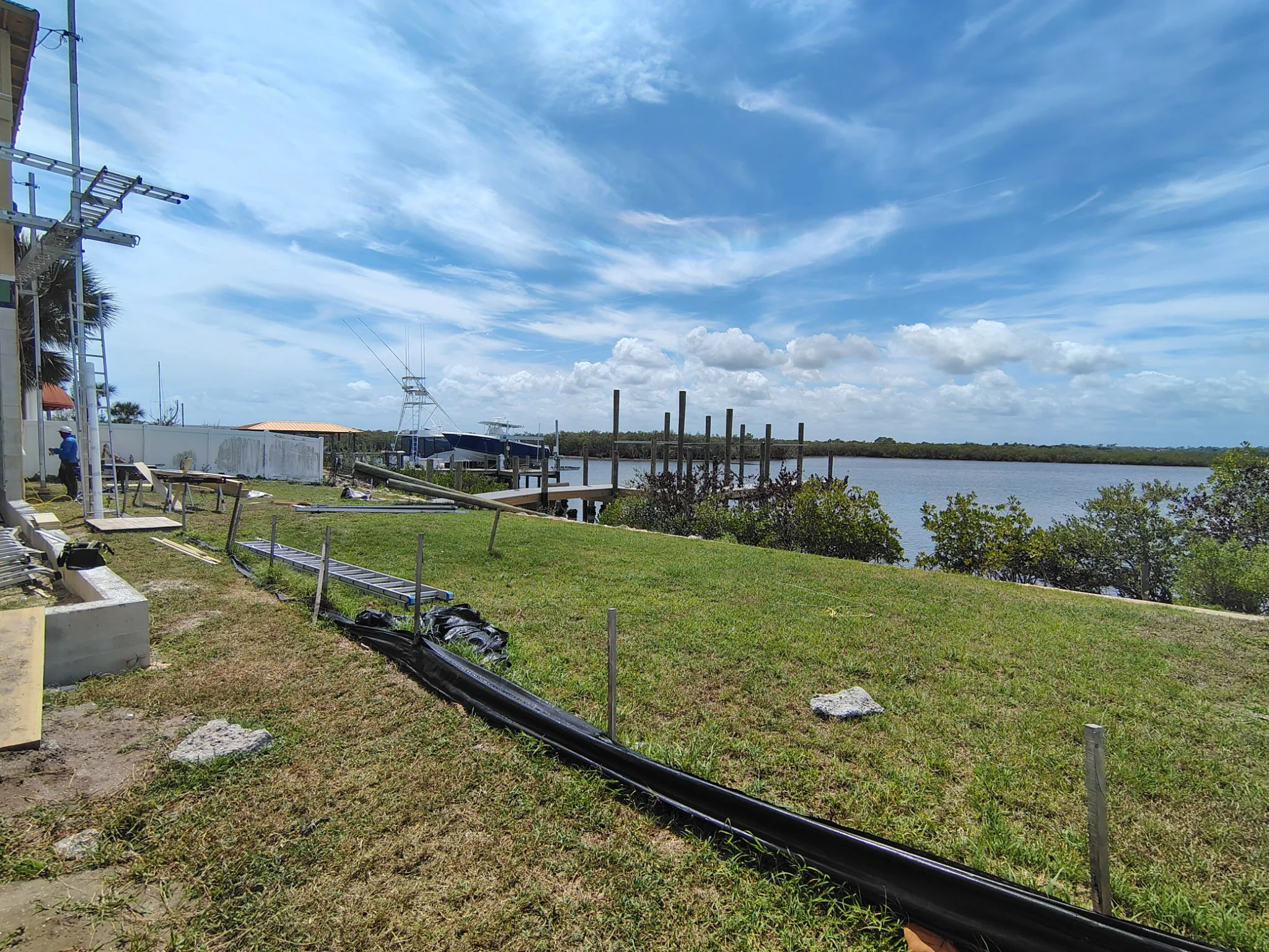 Waterfront view near South Daytona exterior painting project with dock and coastal landscape