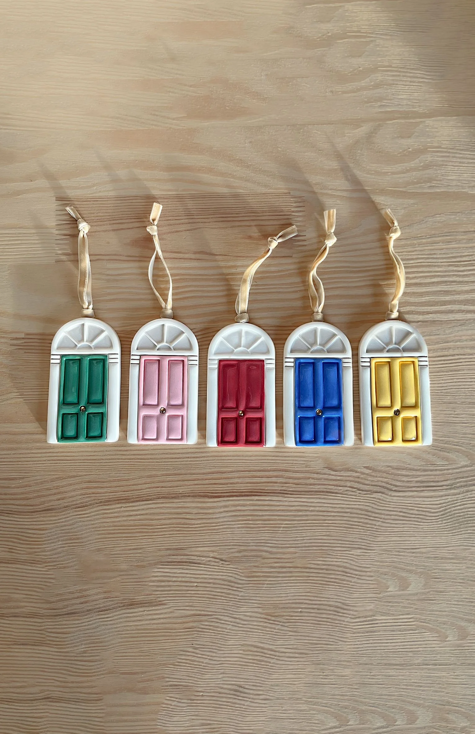 A contemporary interpretation of Dublin’s iconic Georgian doors.

This ceramic ornament celebrates the colour, symmetry and character that define the city’s streets. Each door is carefully shaped and glazed by hand, combining clean lines with soft de
