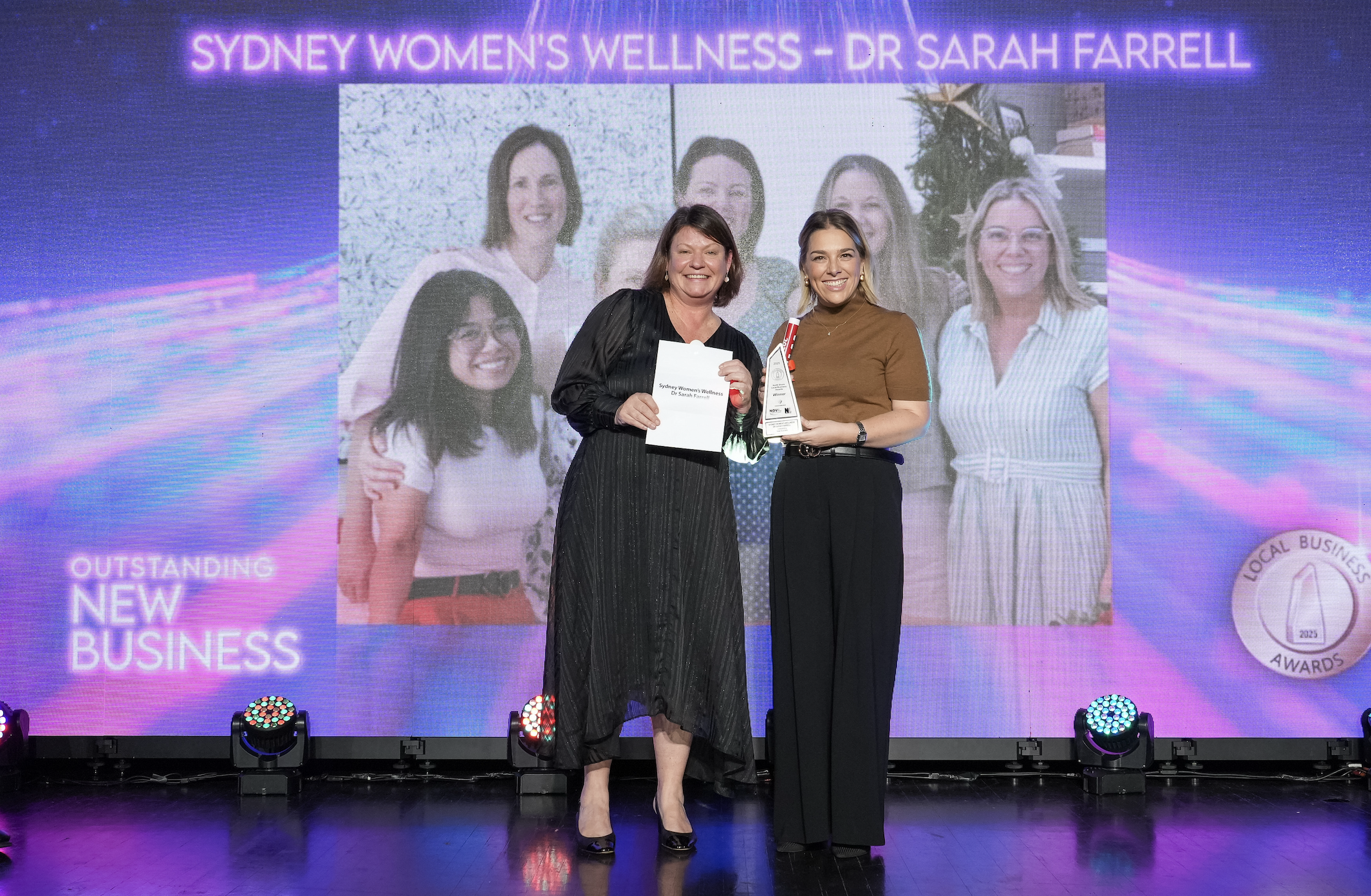 Dr Sarah Farrell accepting the Outstanding New Business Award