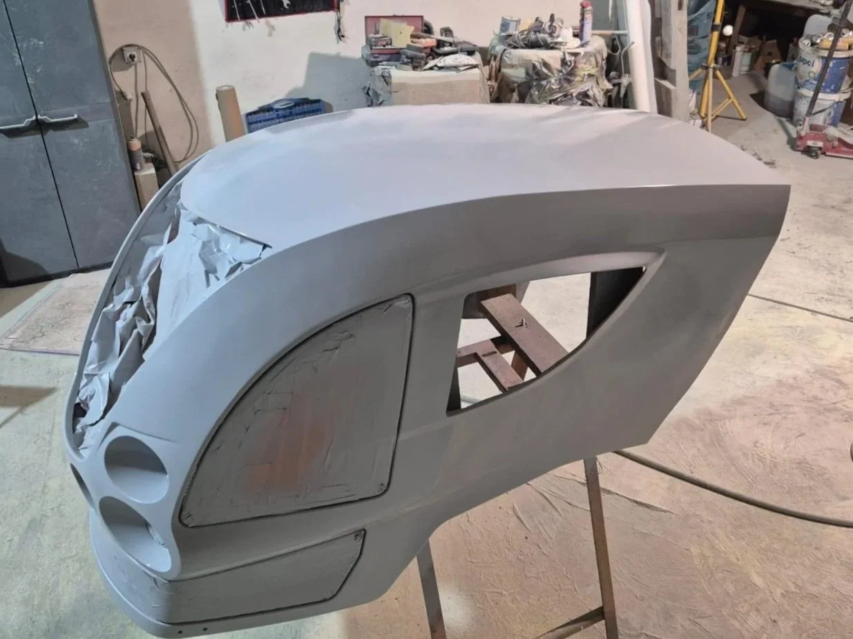Industrial vehicle part after painting and repair