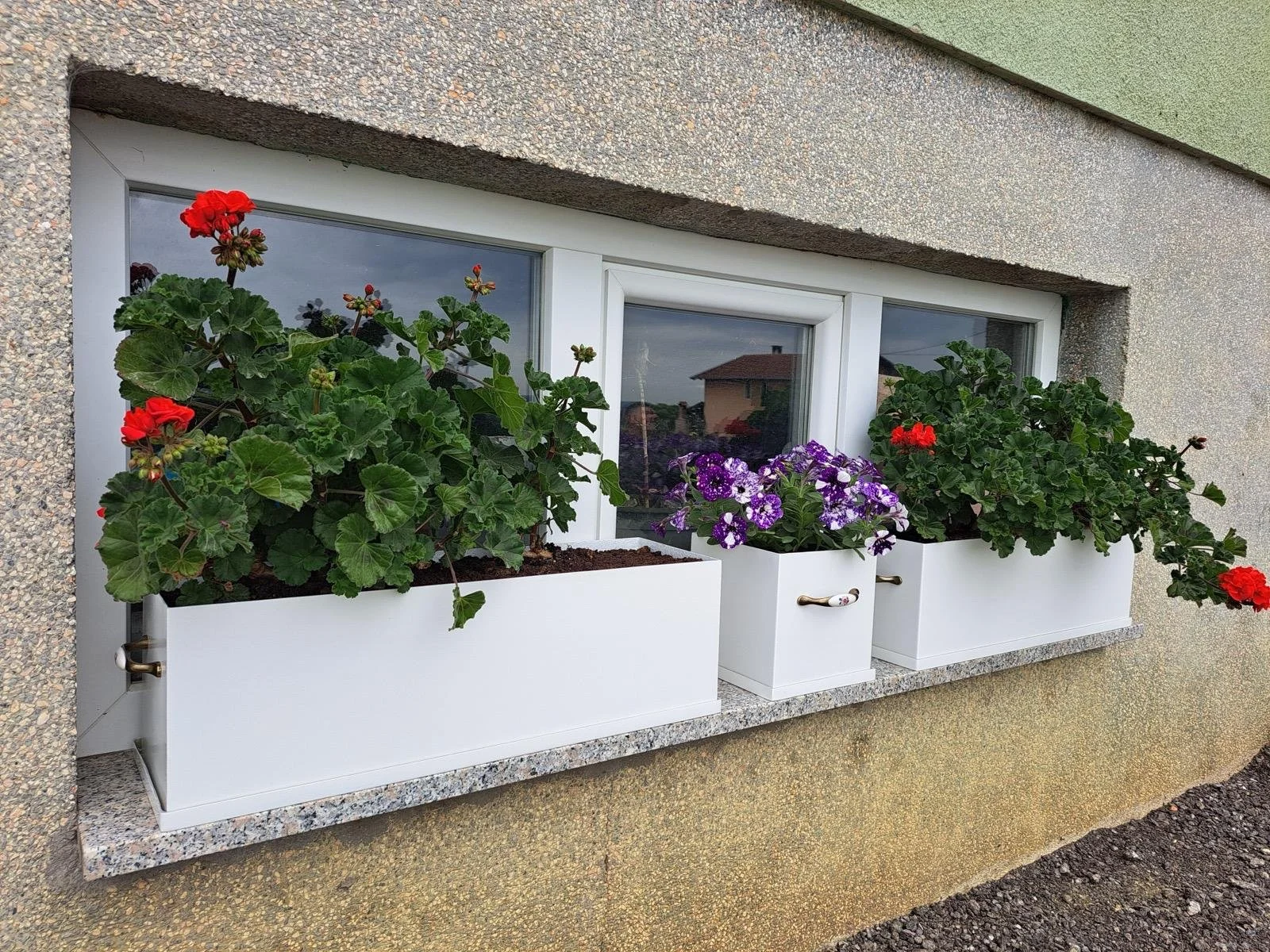 White planters for flowers made from fiberglass composites