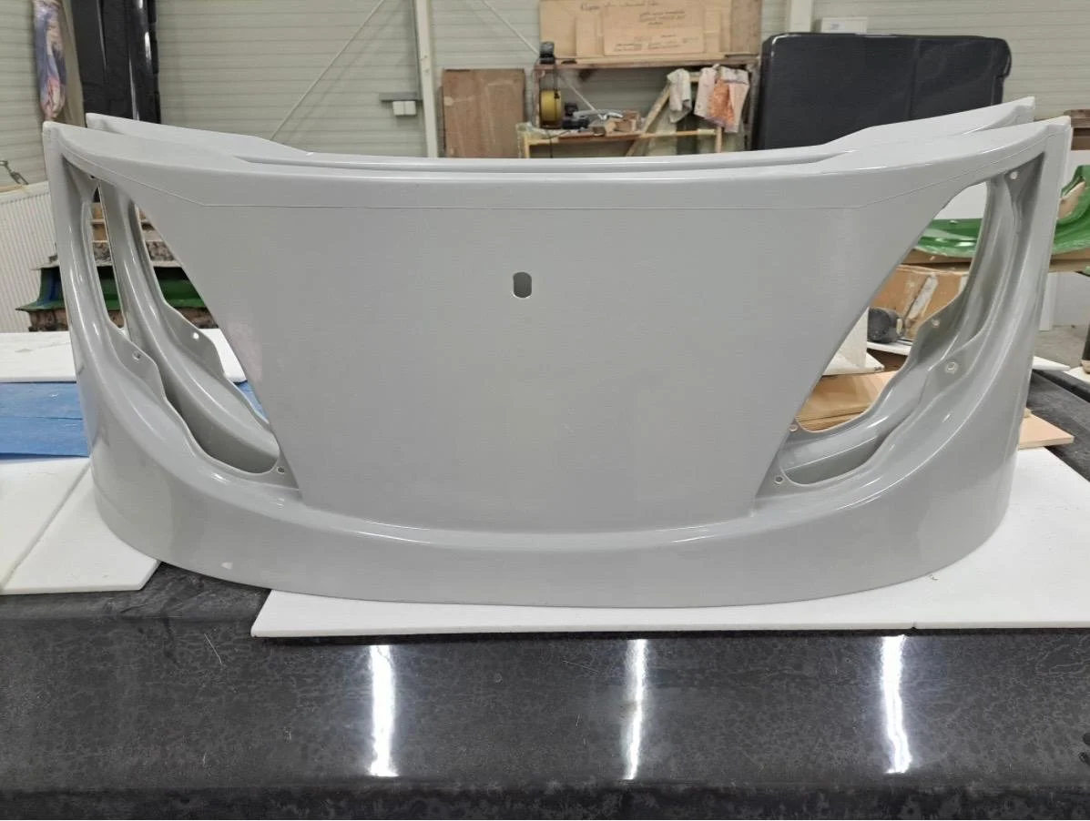 White front tram bumper made from fiberglass composites
