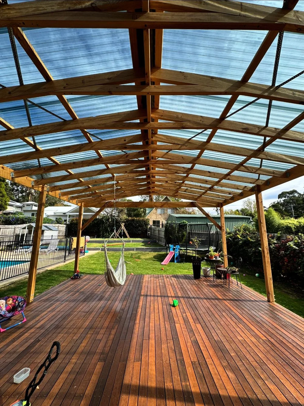 Gable pergola over hardwood deck