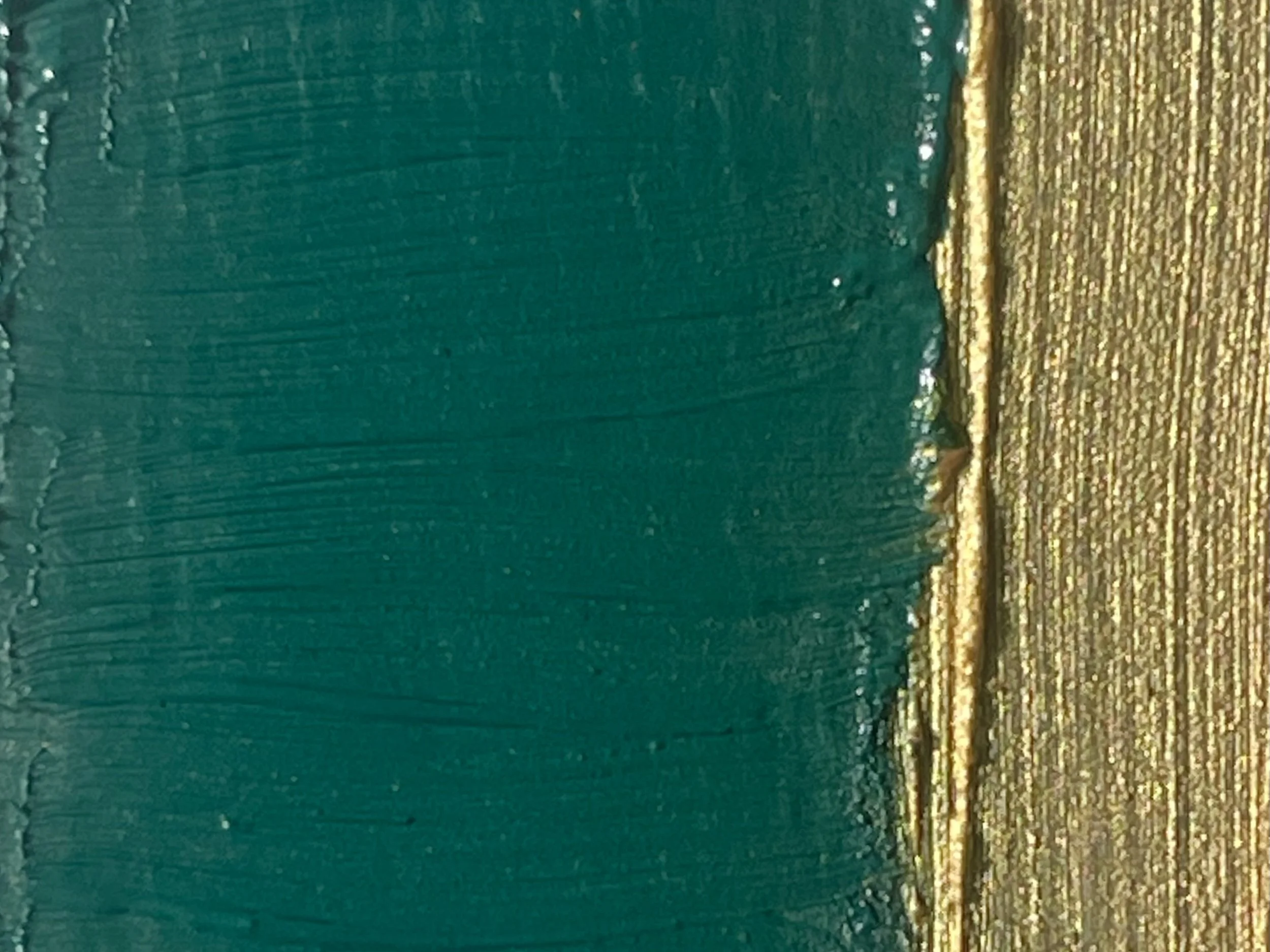Close-up image of a textured painted surface with mainly green and gold colors.