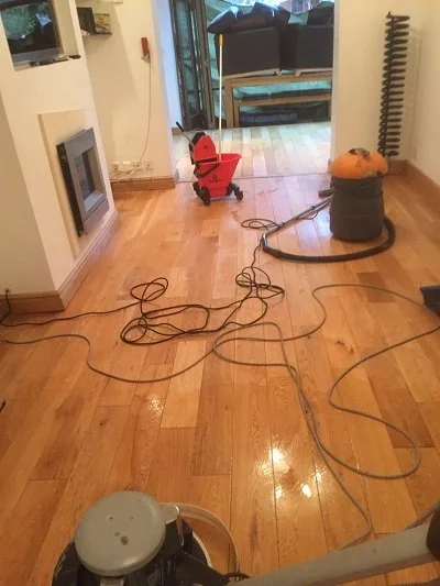 Non-sanding wood floor cleaning
