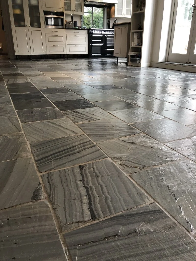 Close-up of slate tile flooring after deep cleaning and sealing.