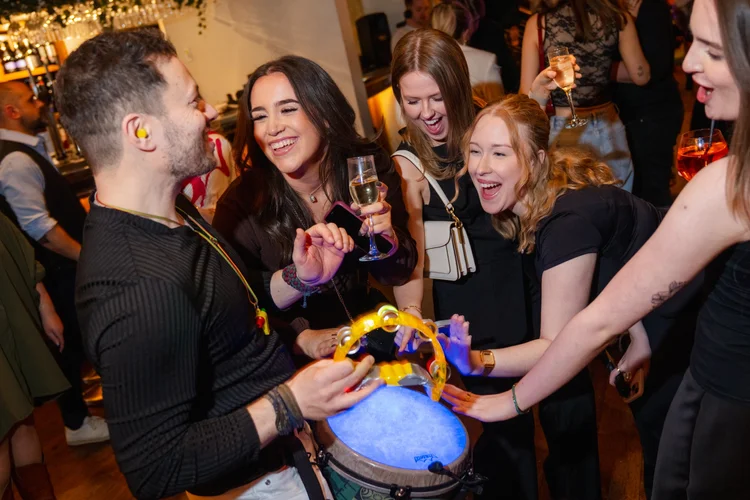 Roaming percussion with smiling guests