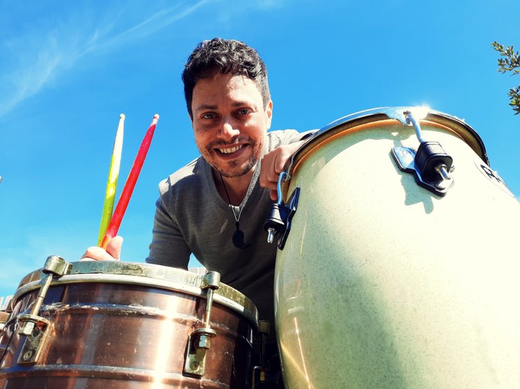 Assaf playing timbales