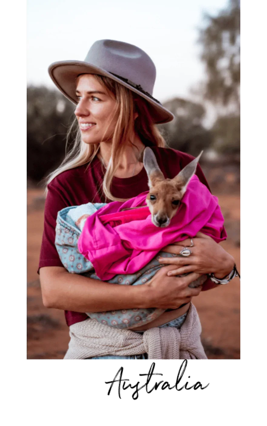 podróżniczka podczas solo wyprawy po australii z kangurem na ręku
