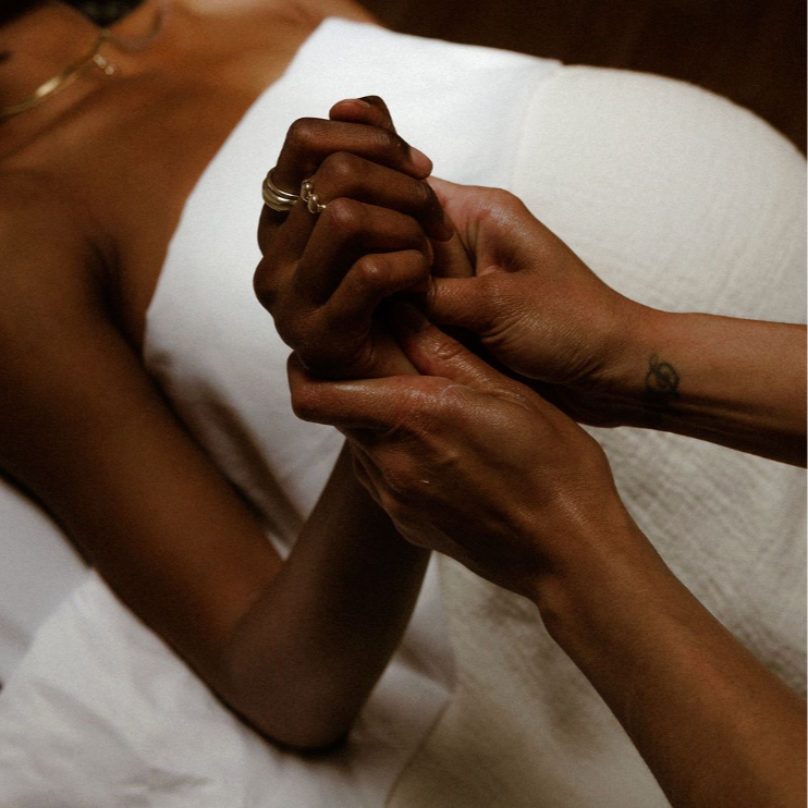 Geometric drawing of an outline square with sections divided by vertical, horizontal, and half circle lines.