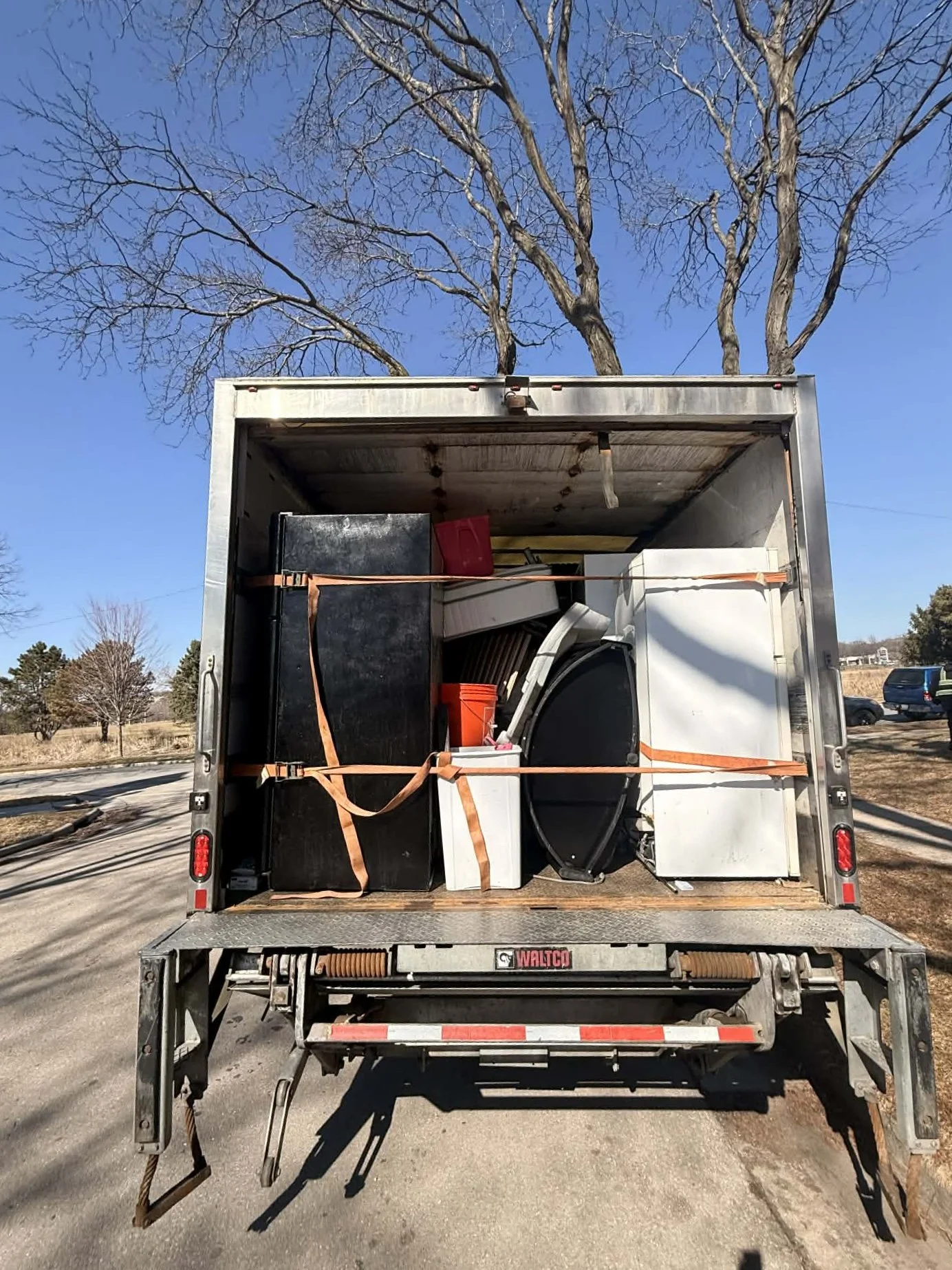 Interior cleanout in progress showing removal of debris, materials, and unwanted items from a residential space.
