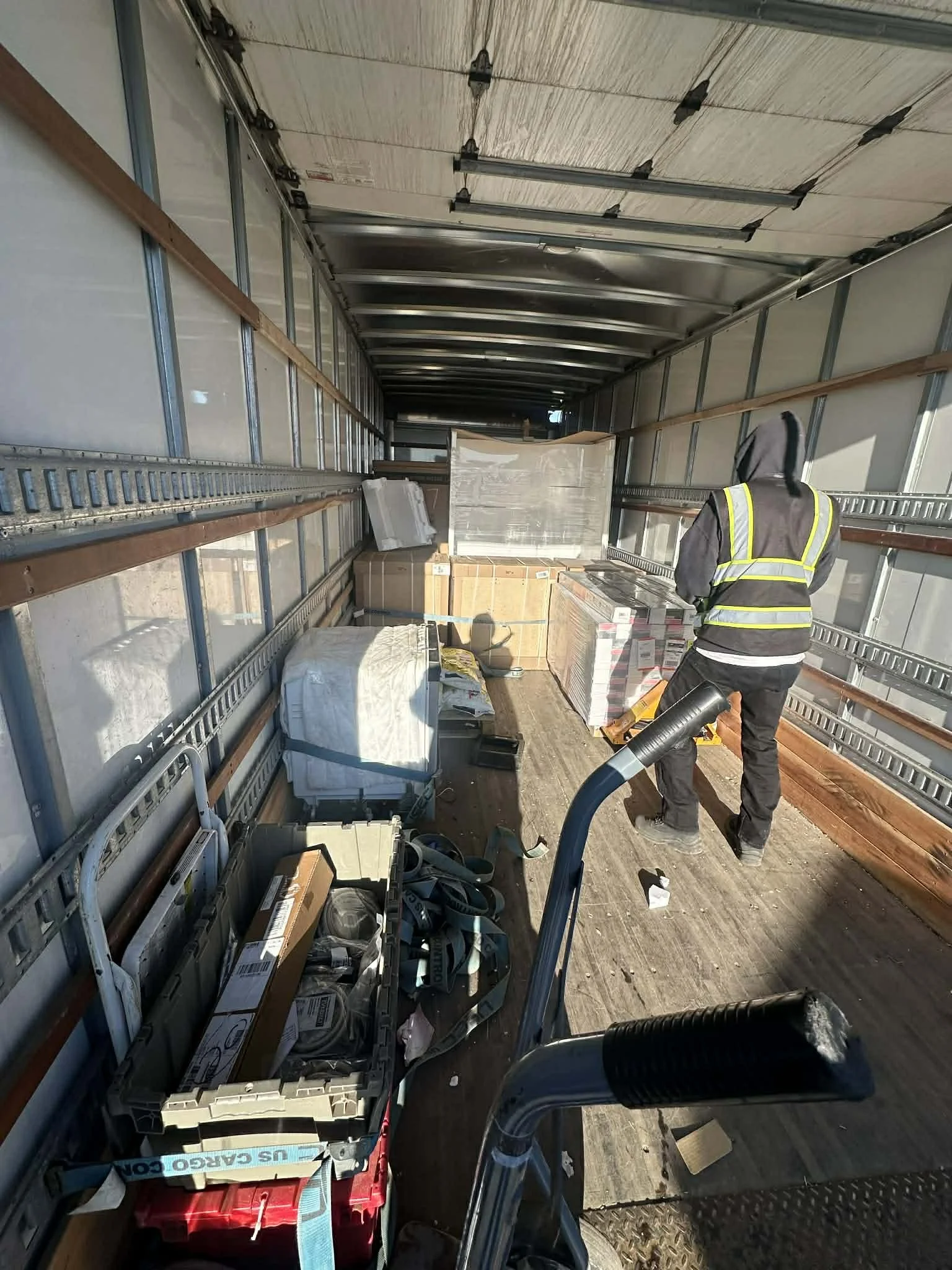 Interior cleanout completed showing removal of debris, materials, and unwanted items from a residential space.