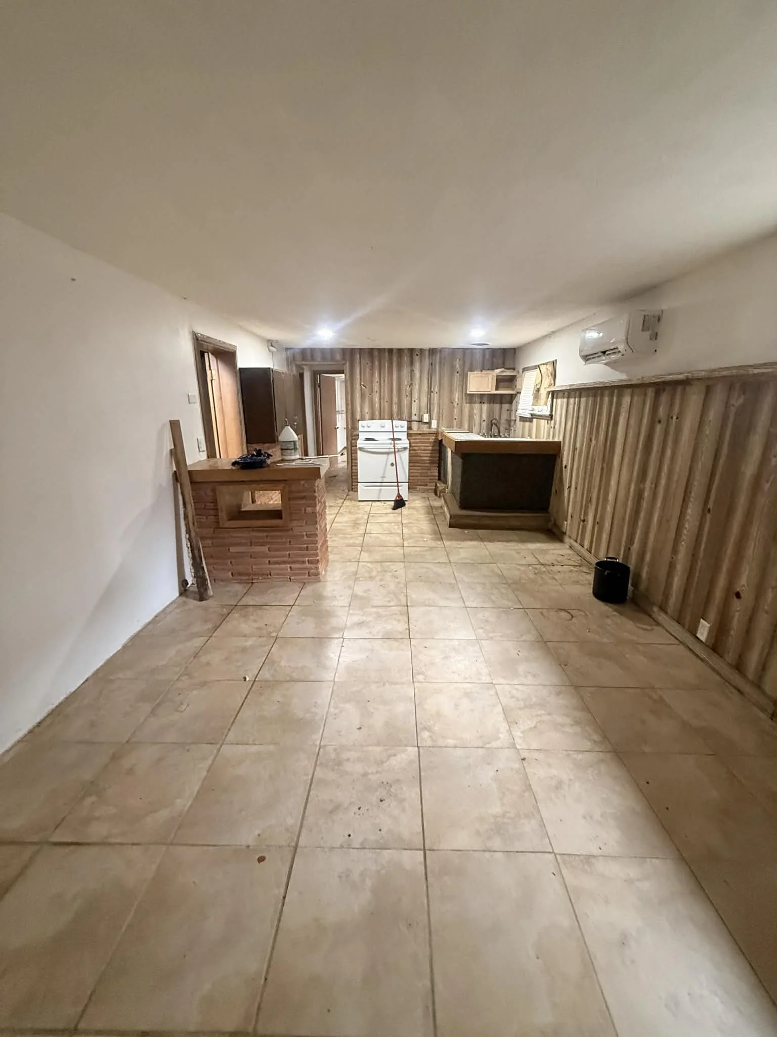 Interior cleanout completed showing removal of debris, materials, and unwanted items from a residential space.