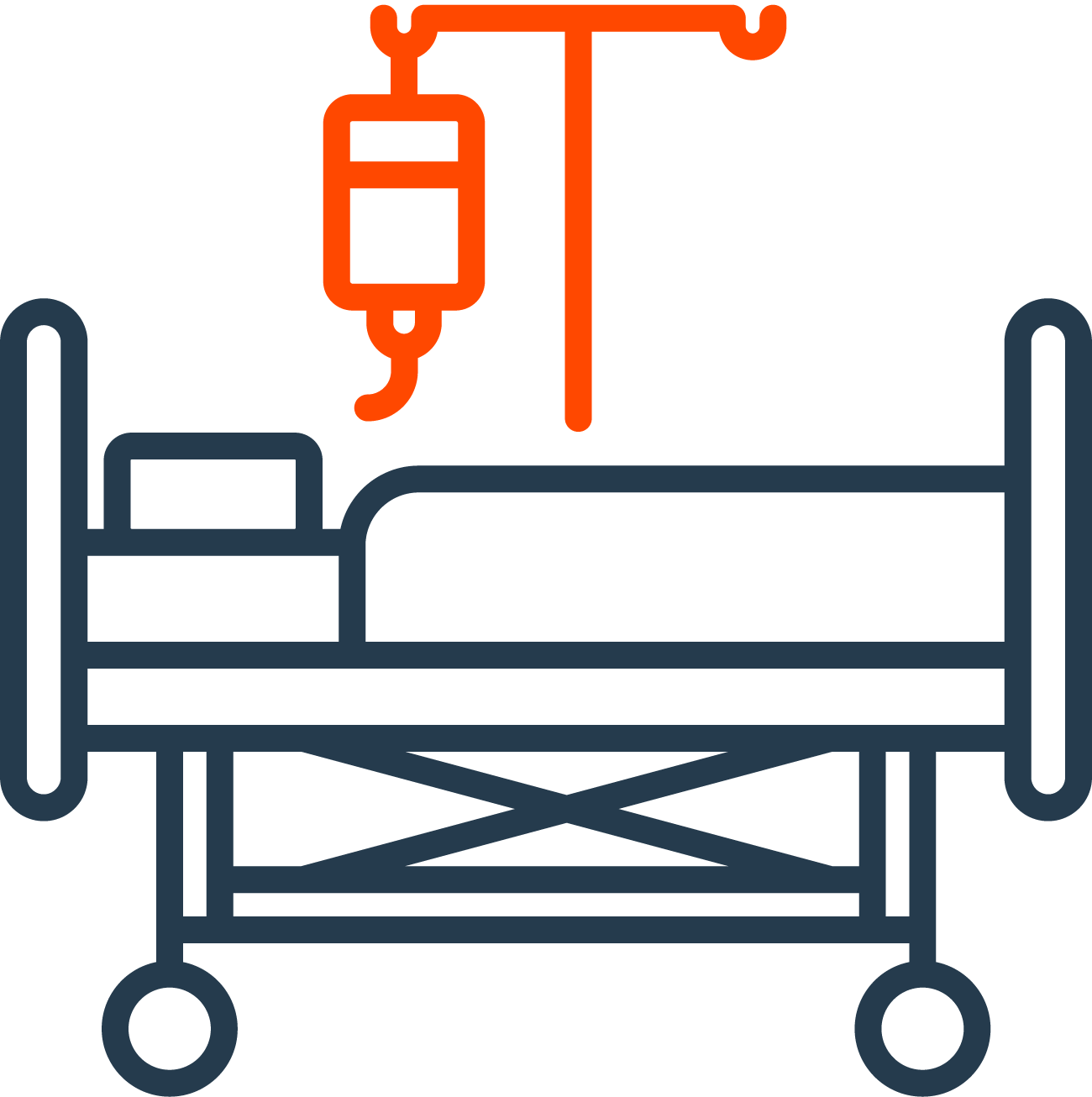 Hospital bed with an IV drip hanging above it.