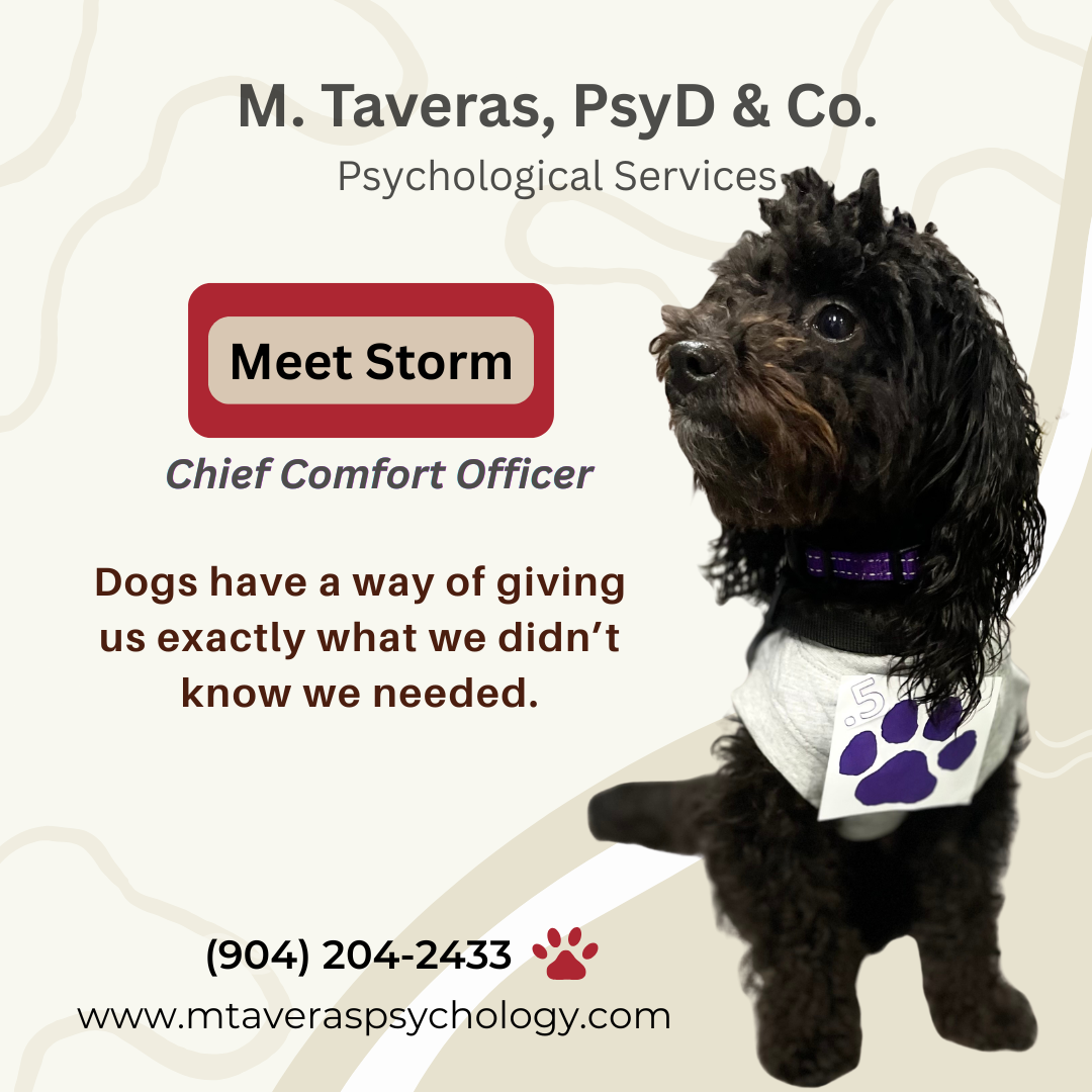 Business card for M. Taveras, PsyD & Co., Psychological Services, featuring a black dog wearing a harness and a tag with paw prints, with contact information and a quote about dogs' intuitive nature.
