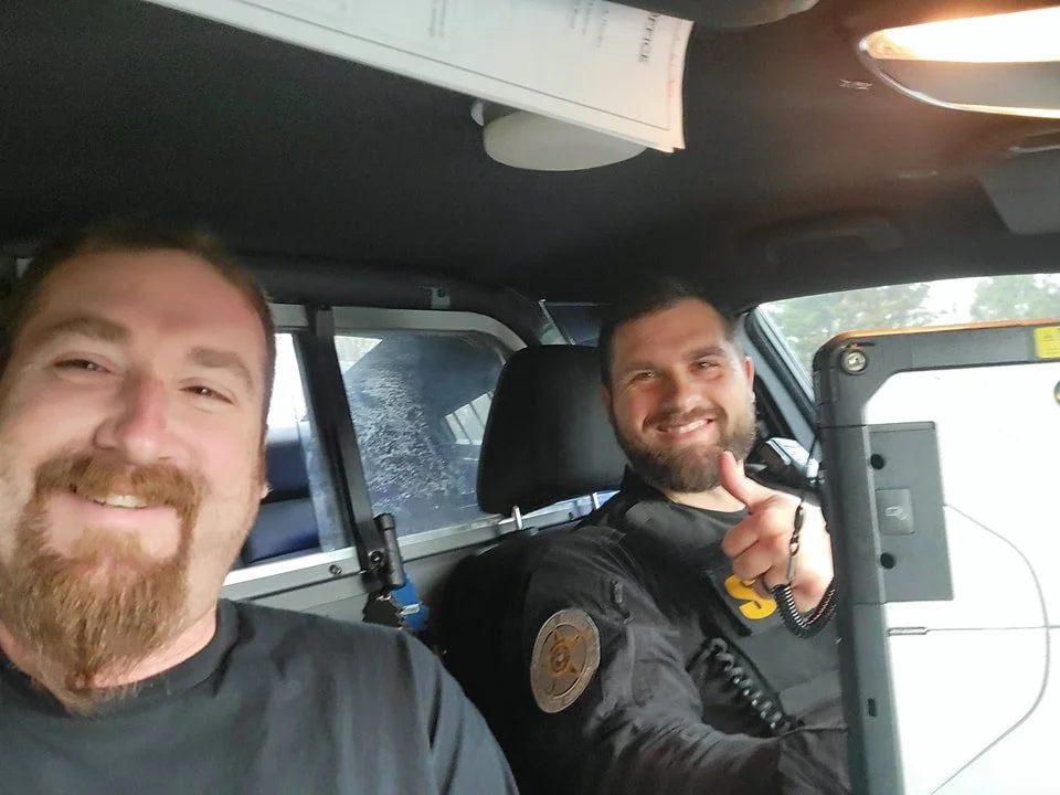 Could not have timed any better if tried!!! Pulled over due to "following too close" when the lady in front hit the brakes when she had seen him. In turn my gap closed to 1.5 cars. 
Fast forward, he asked me to go back to his car. Now I've 