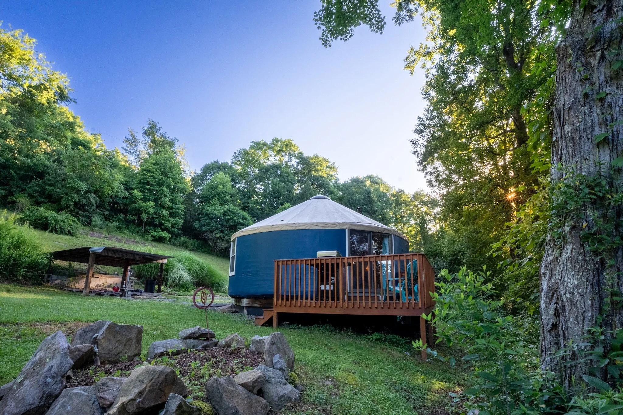 Sunrise over the cozy yurt at New River Nooks in Fayetteville, WV.