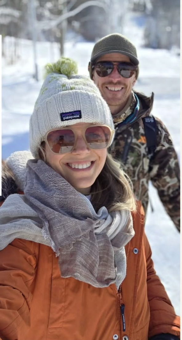 Hosts Landon and Lauri Brammer outdoors in the snow in West Virginia