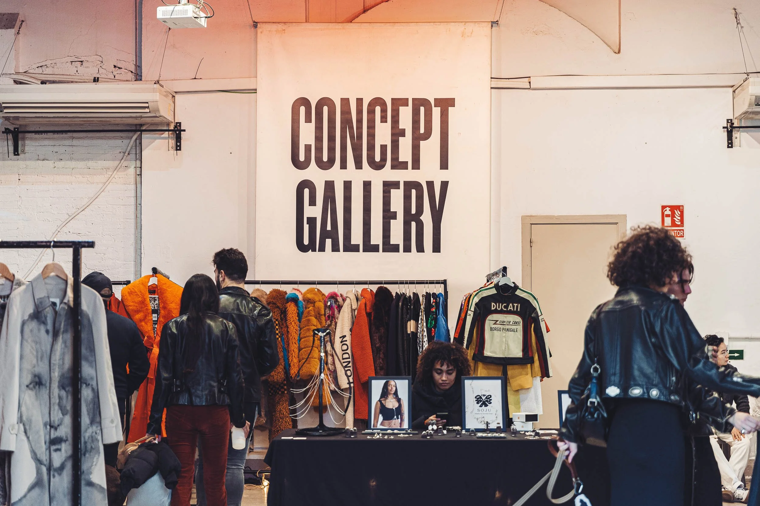 People entering a concept gallery space during an event in Barcelona