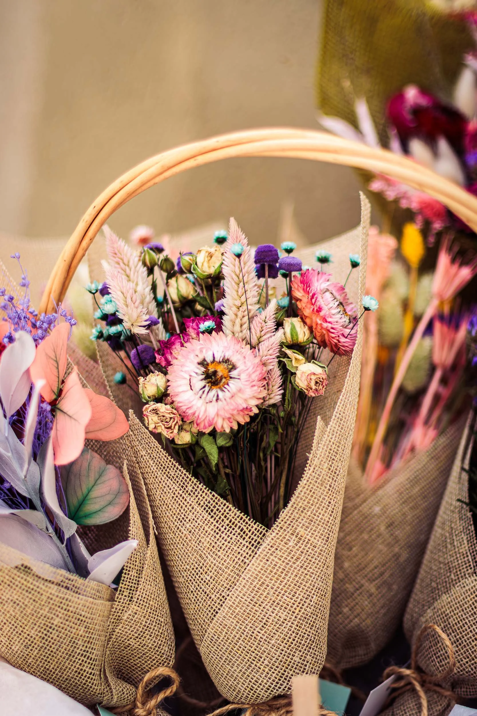 Handmade flower bouquets in paper sleeves displayed at the Sense showroom in Barcelona