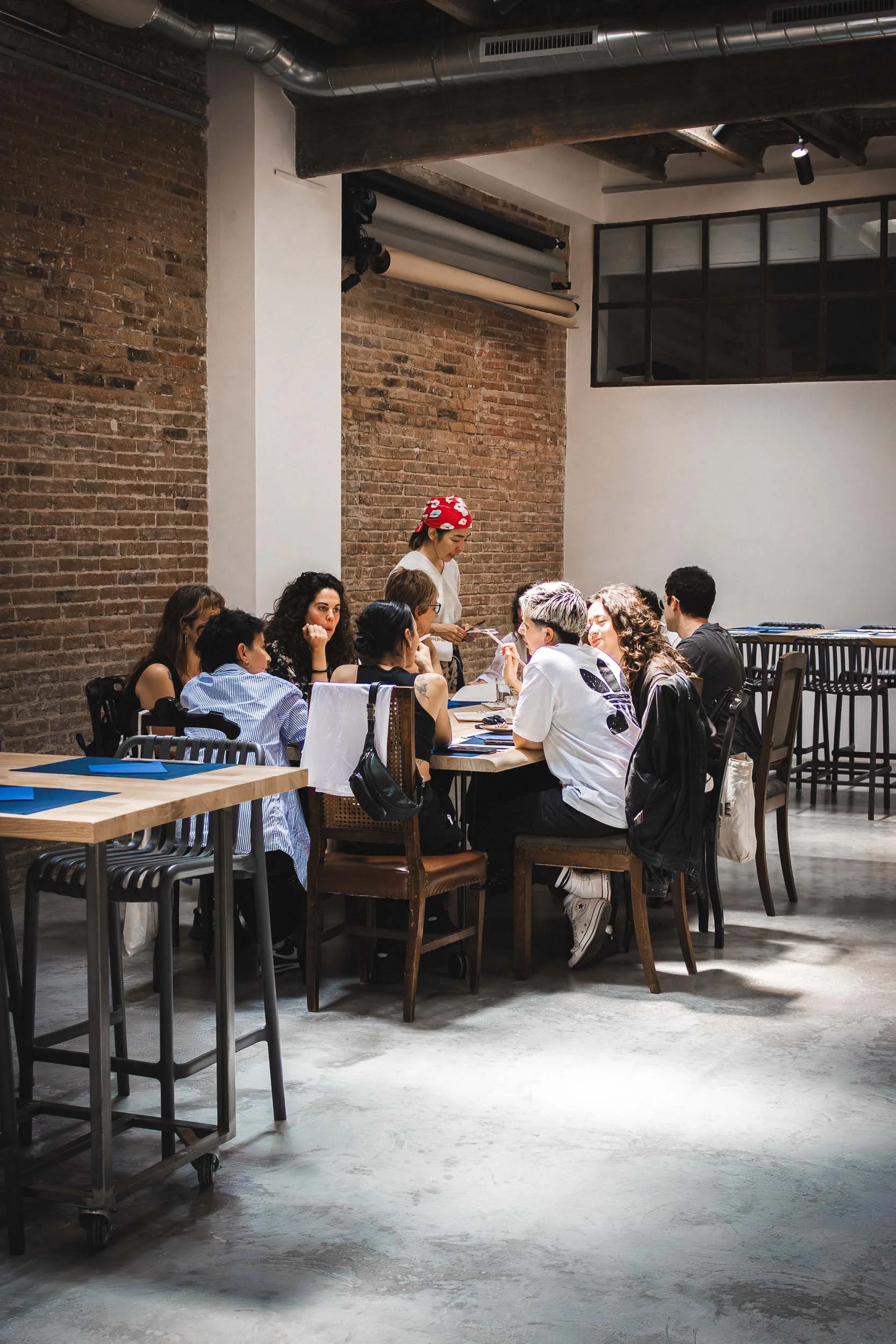 Guests dining together inside Barcelona restaurant