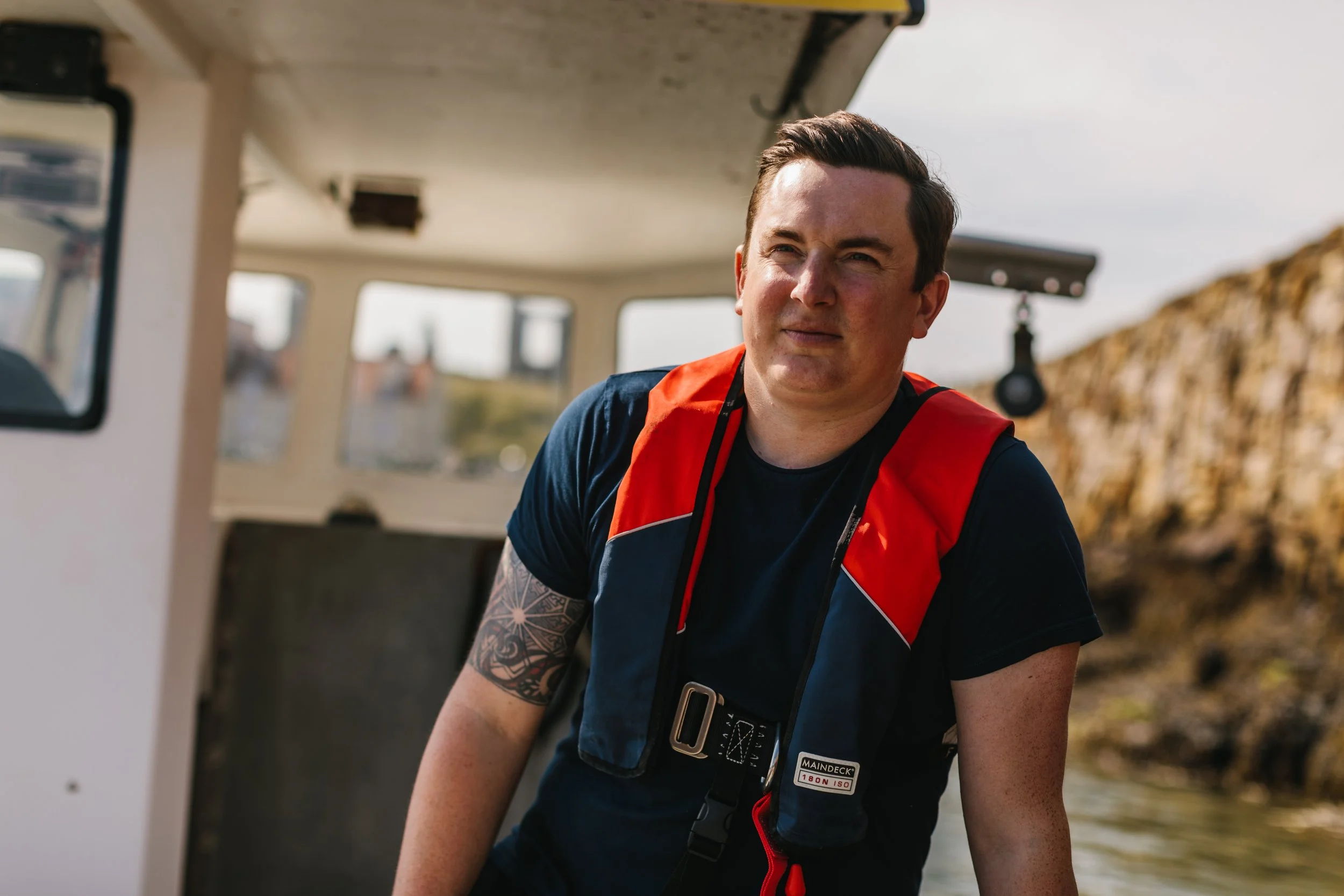 Chef Dean Banks on a fishing boat in St. Andrews