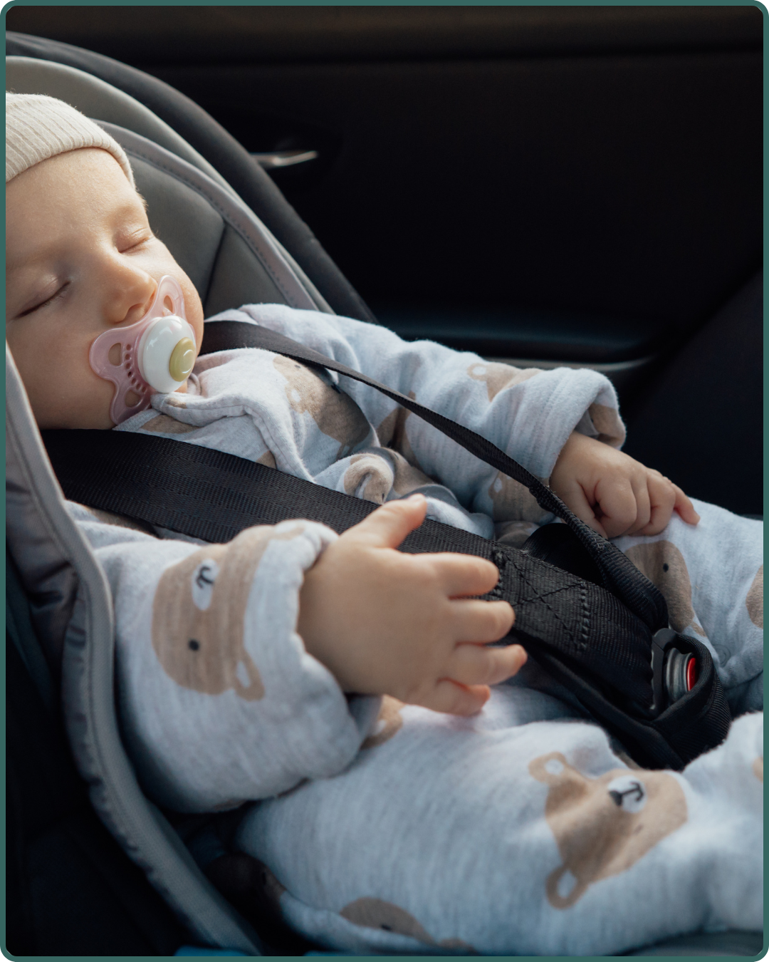 Tiny baby in a car seat