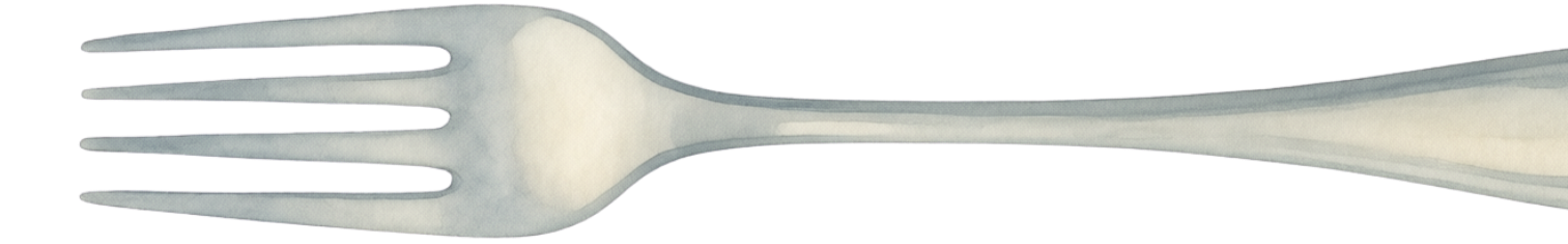 Close-up of a metal fork with four tines on a dark surface.