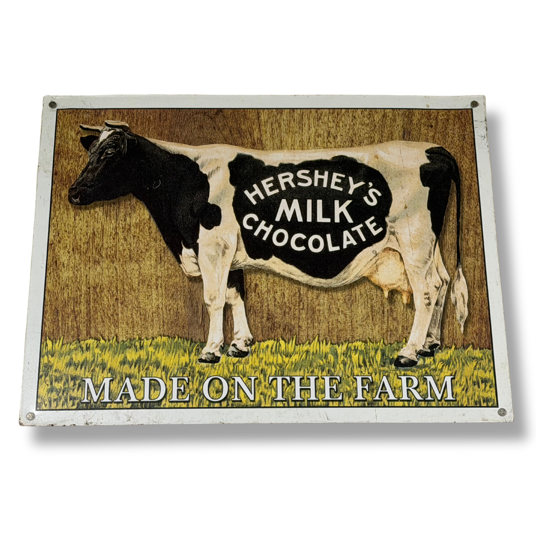 Vintage sign with a black and white cow at Sweet-T-Cafe in West Jefferson, NC.