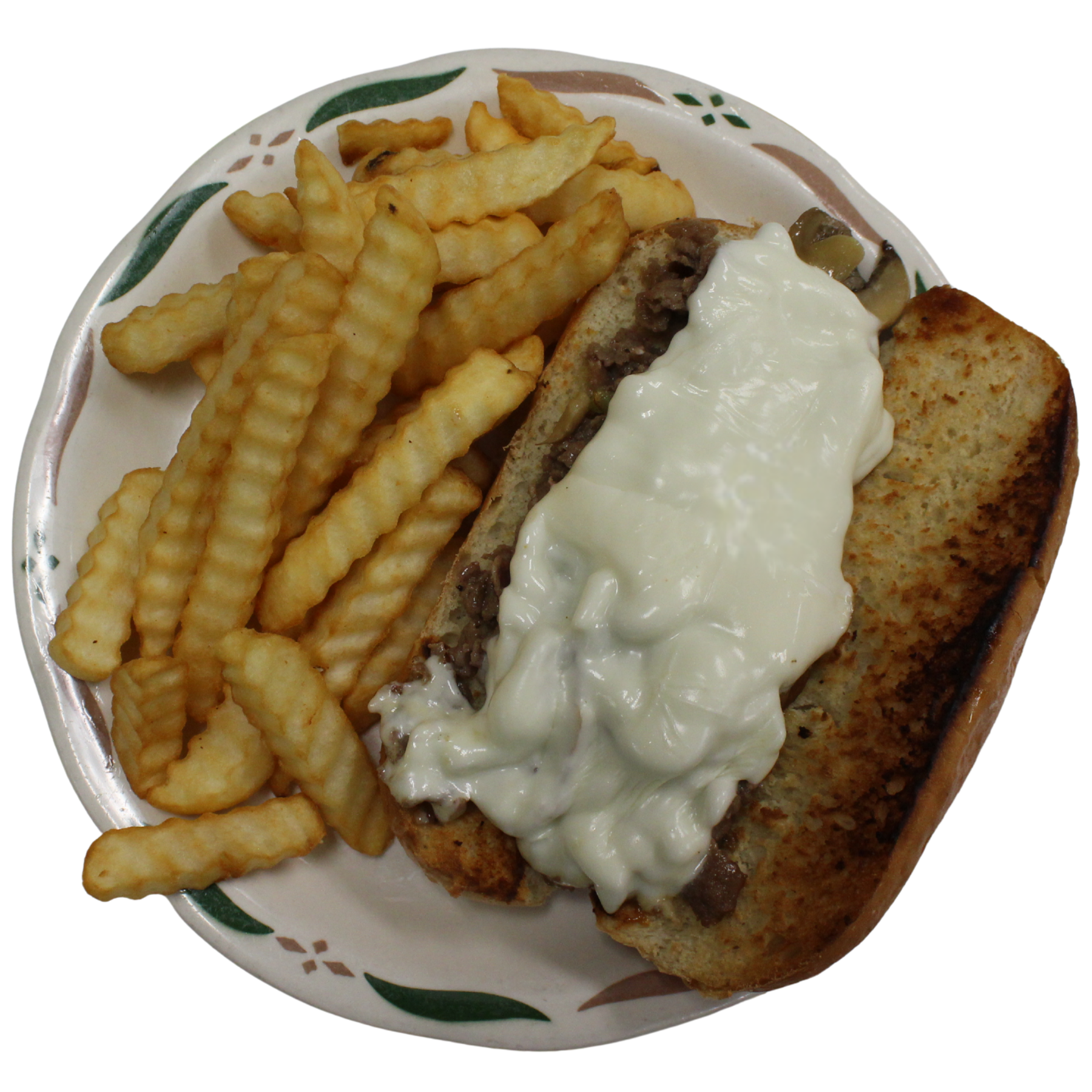 Plate of French fries and a cheesesteak sandwich with melted cheese and onions at Sweet-T-Cafe in West Jefferson, NC.
