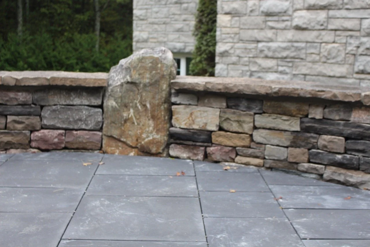I love mixing in boulder to drystone walls