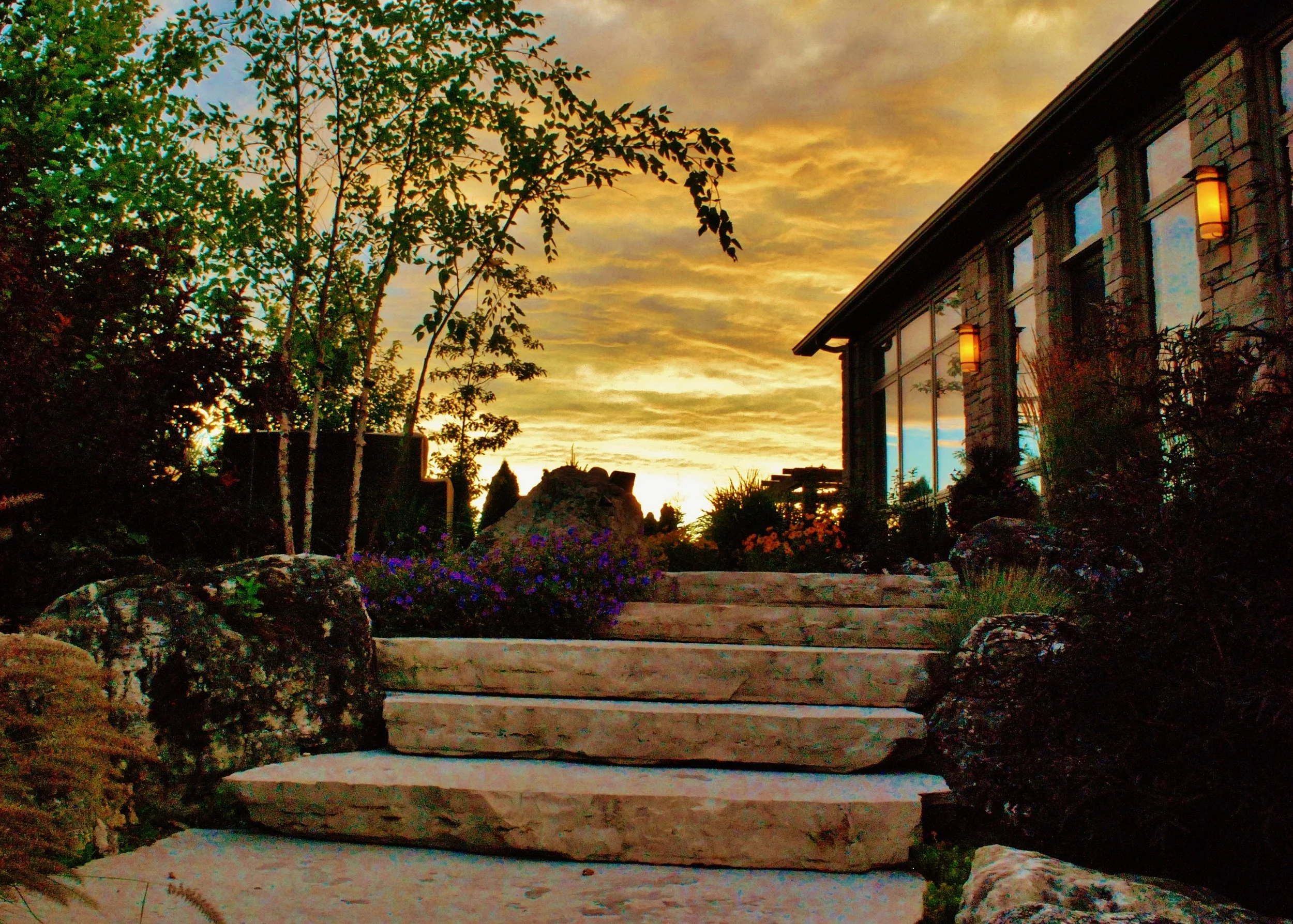 Limestone Steps at leading to patio at dusk 