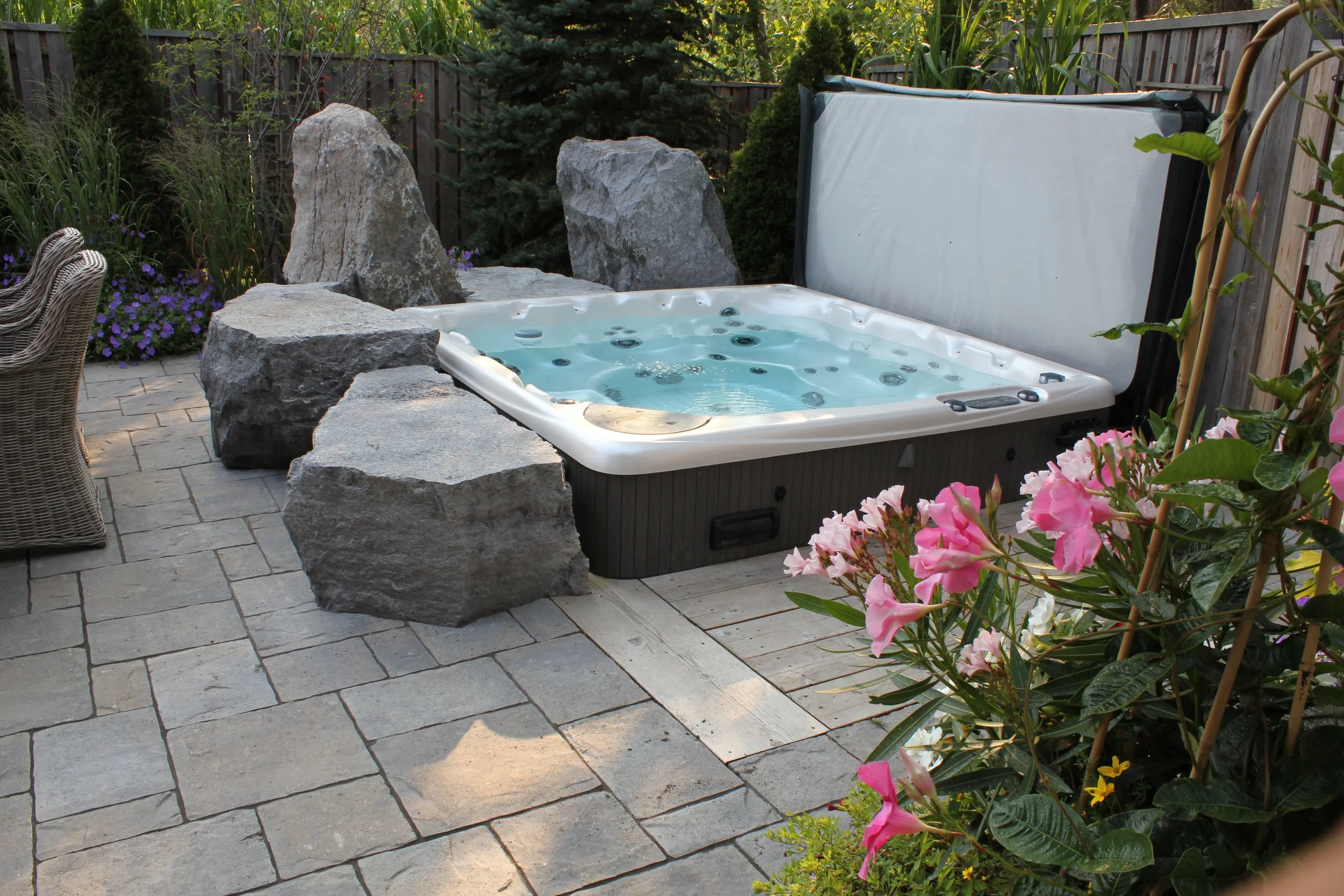 Armourstone positioned just right to set your drink on will in the hot tub