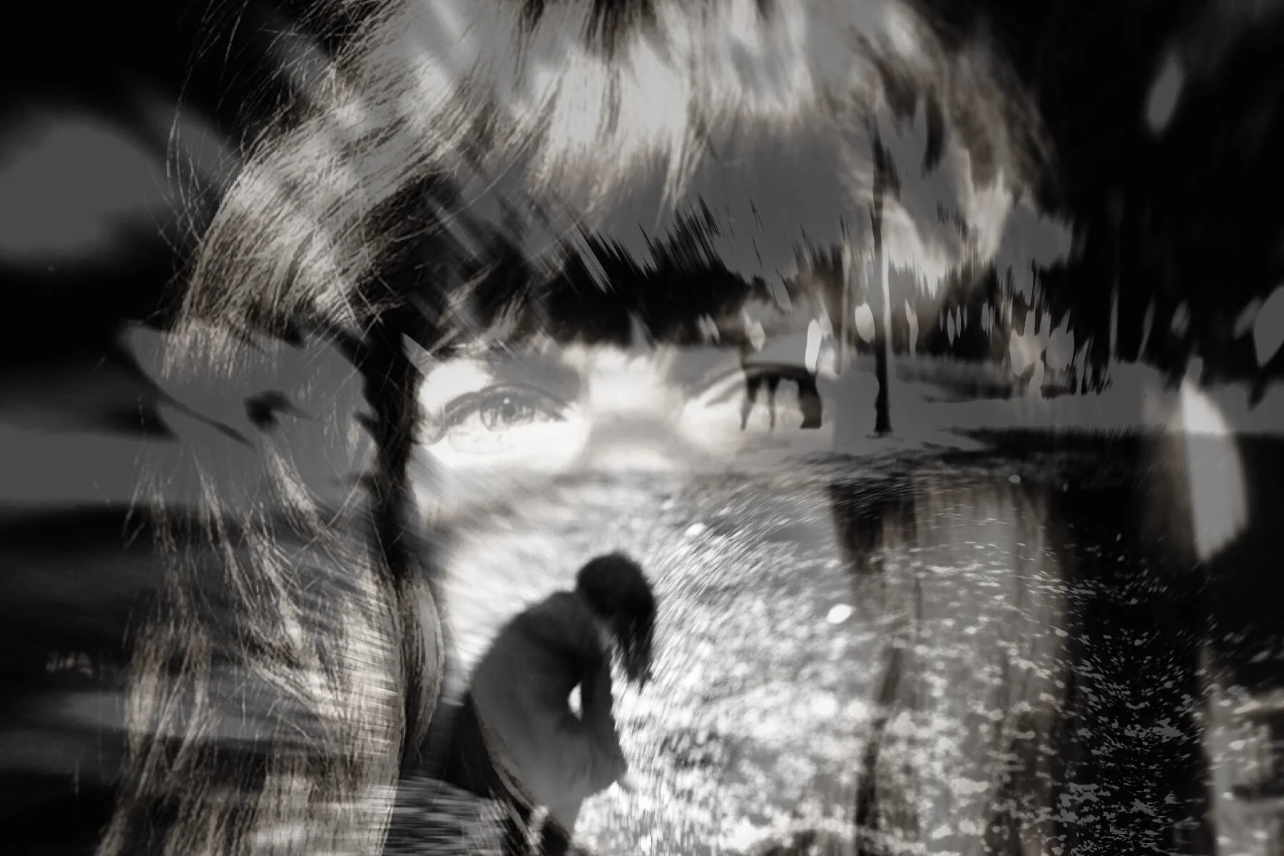 A Kerry Payne image featuring a double exposure black and white photograph combining a woman's face with a beach scene, including a girl playing by trees, creating an artistic layered effect.