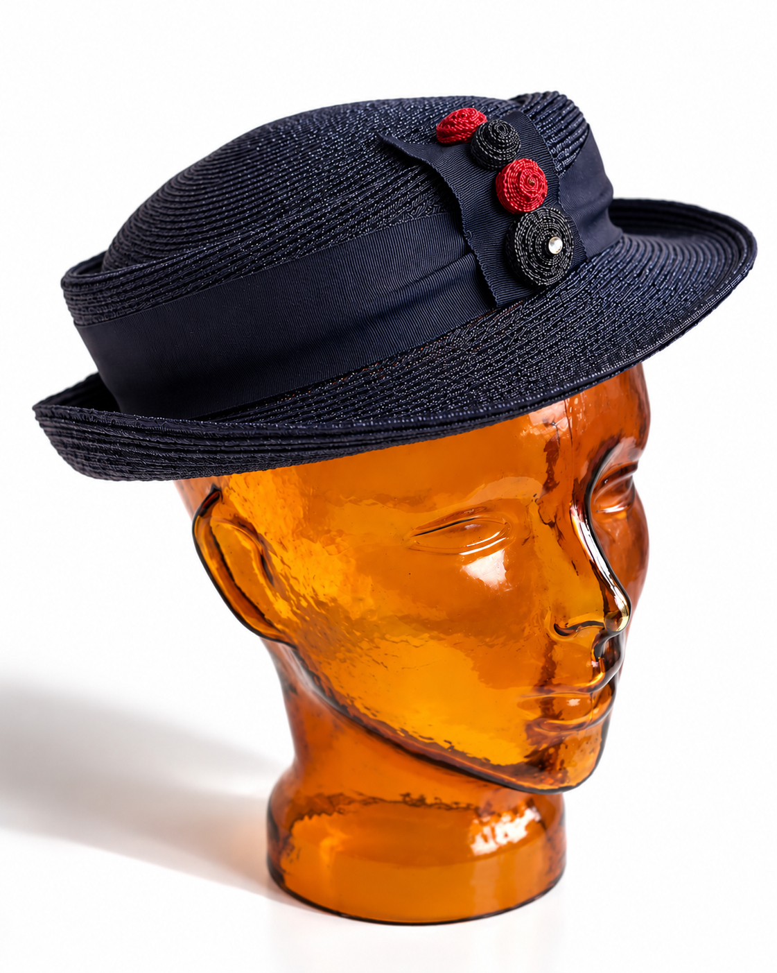 Amber Glass Mannequin with Navy Ribbon Hat.png
