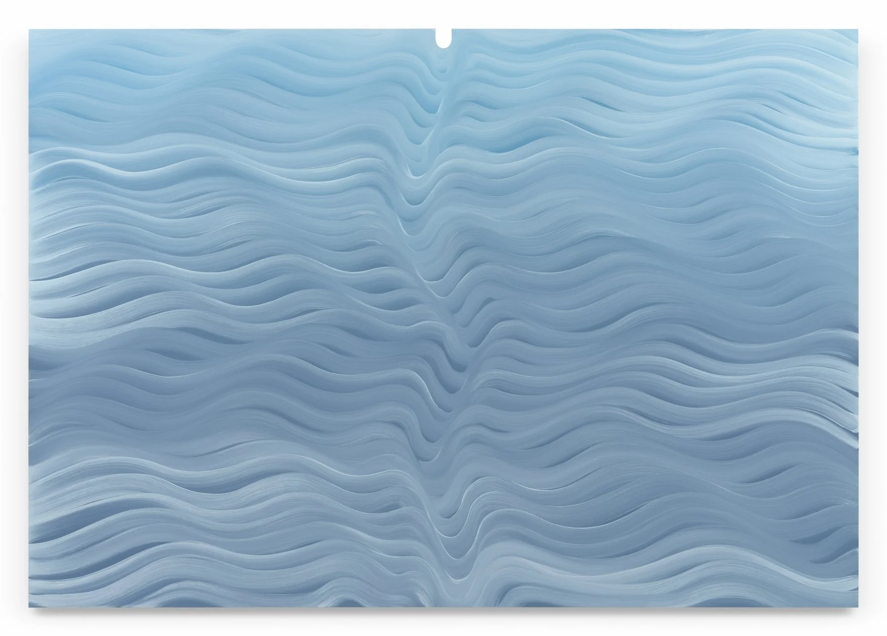 Close-up of a light blue, textured surface with wavy, flowing lines.