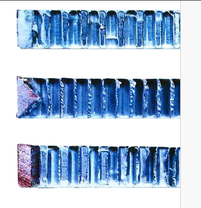 Close-up of different edge treatments for aluminum honeycomb panels, epoxy-filled, wood edge with a v-groove, and wood edge, arranged in horizontal rows.