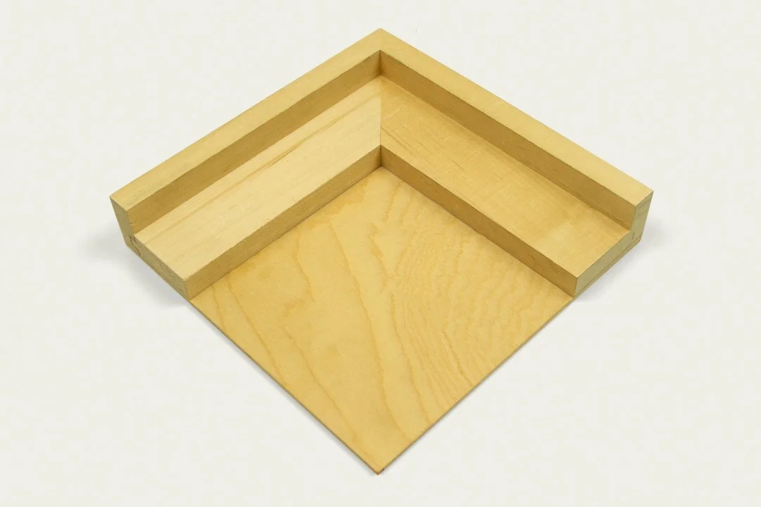 A wooden panel corner.