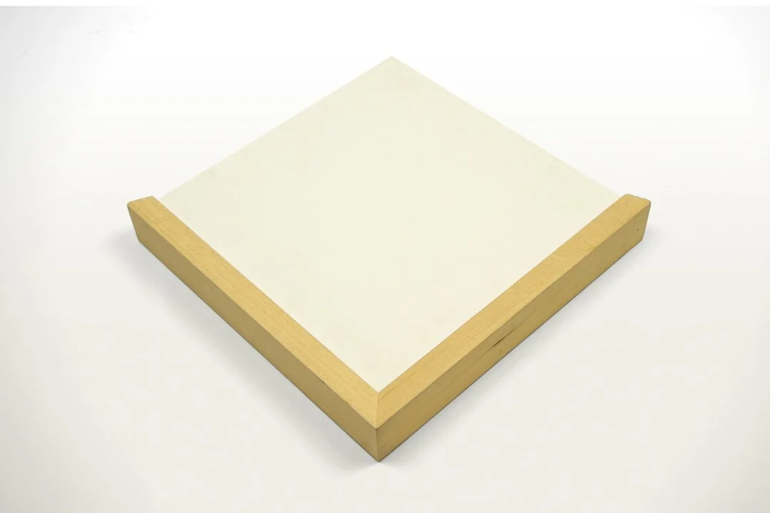 A semi rigid art panel made up of acid-free gatorfoam on a wood cradle with a white background.