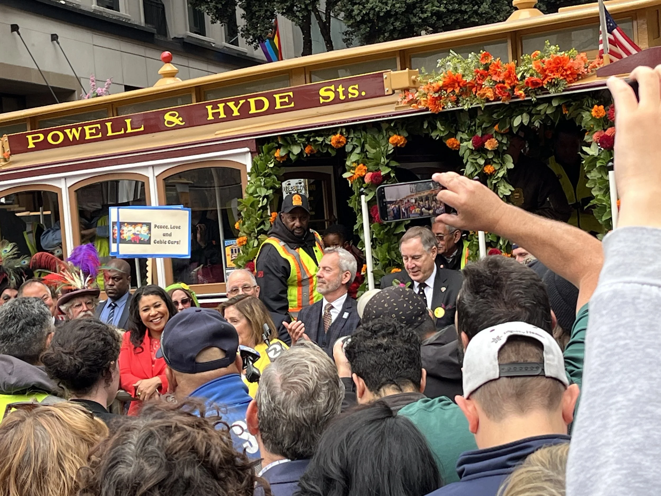 Dahlias festoon the cable car.