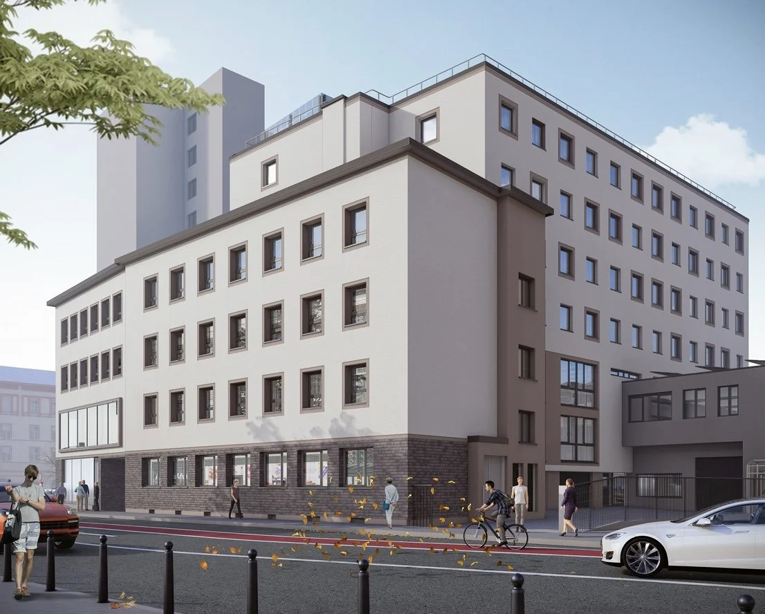 Ein modernes mehrstöckiges Apartmenthaus in städtischer Umgebung mit Menschen auf dem Bürgersteig