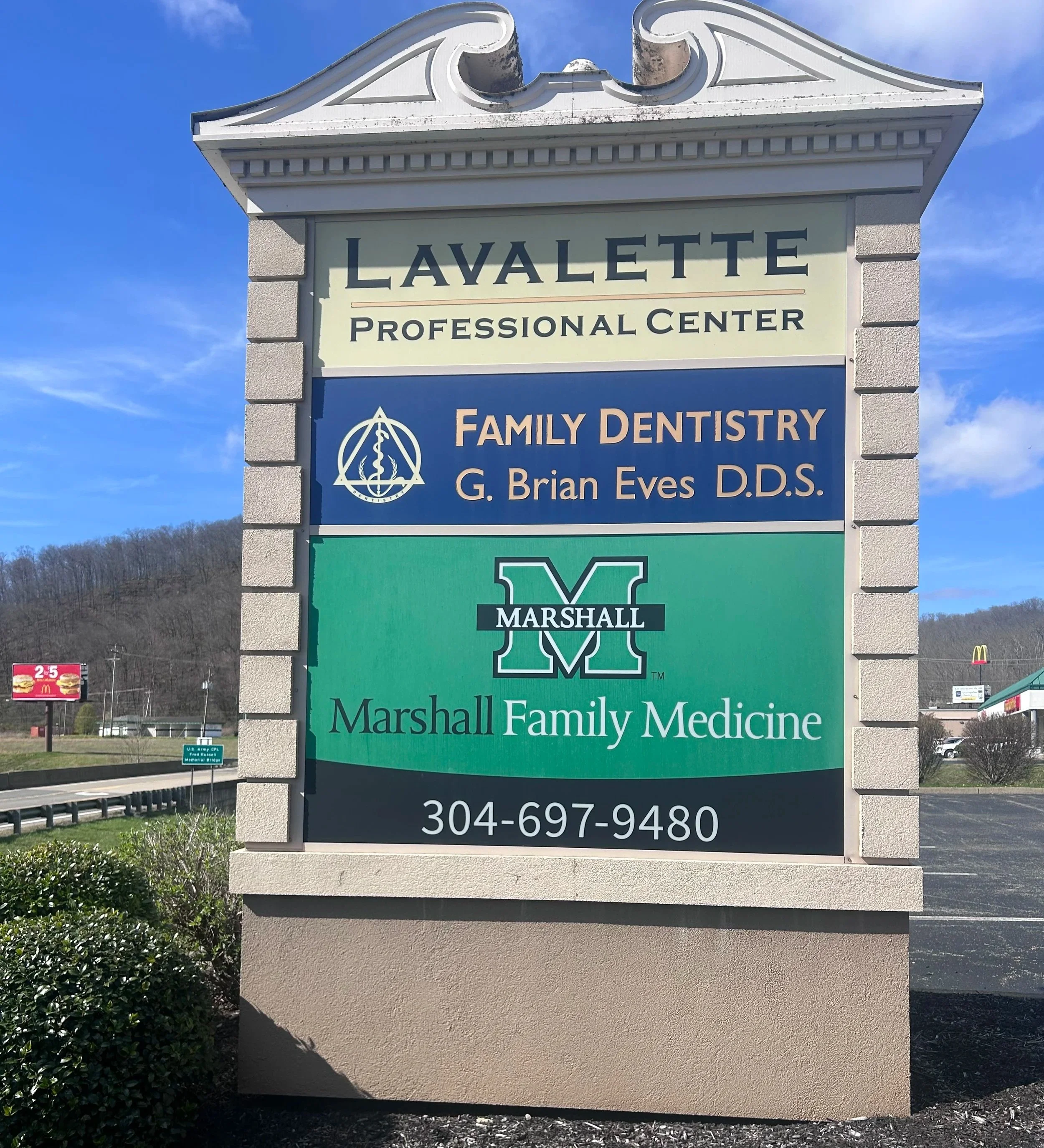Sign for Lavalette Professional Center advertising family dentistry by G. Brian Eves D.D.S. and Marshall Family Medicine.