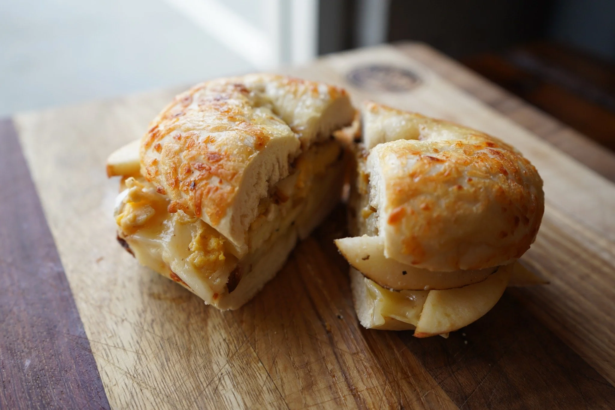 Sweet, savory and perfectly satisfying! The harvest caprese bagel is made with fresh gala apple, crisp Asian pear, creamy brie, spiced fig jam, and a warm egg patty layered on a perfectly toasted bagel.