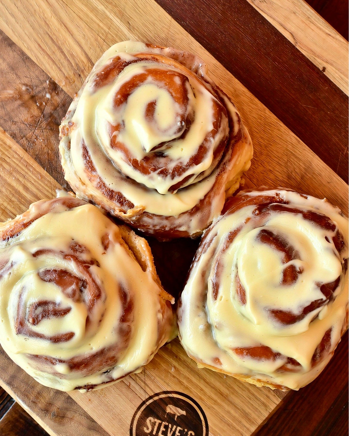 We've been working hard behind the scenes, and tomorrow we finally get to share it with you!! We've been baking, testing, and perfecting...

Fresh, warm, scratch-made cinnamon rolls are making their debut at Steve's! Made with all of the gooey cinnam